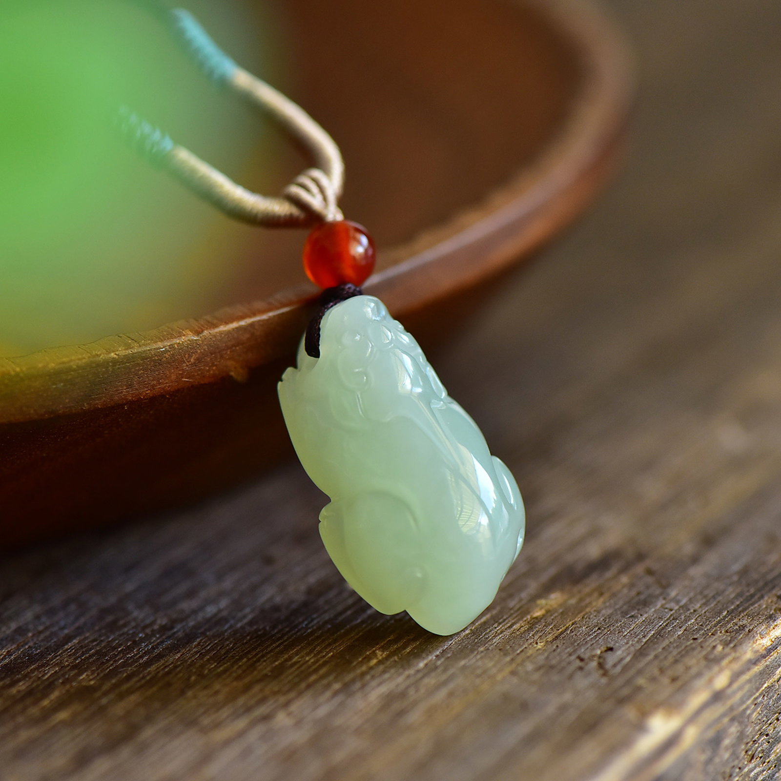 An Exquisite Greenish Jade Auspicious Beast Pendant - 2