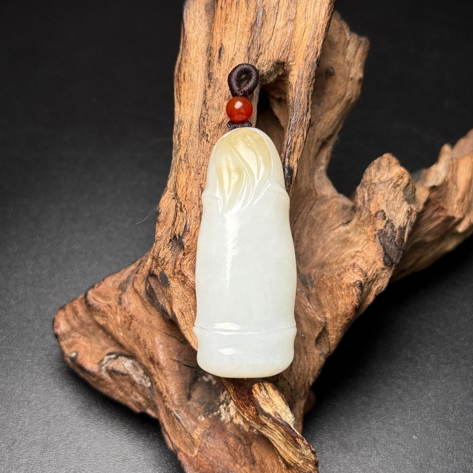An Exquisite White Jade Bamboo Pattern Pendant: Estimated Value:360-800 An Exquisite White Jade Bamboo Pattern Pendant,Qing Dynasty,China,Size:48mmx20mmx12mm,Weight:22g