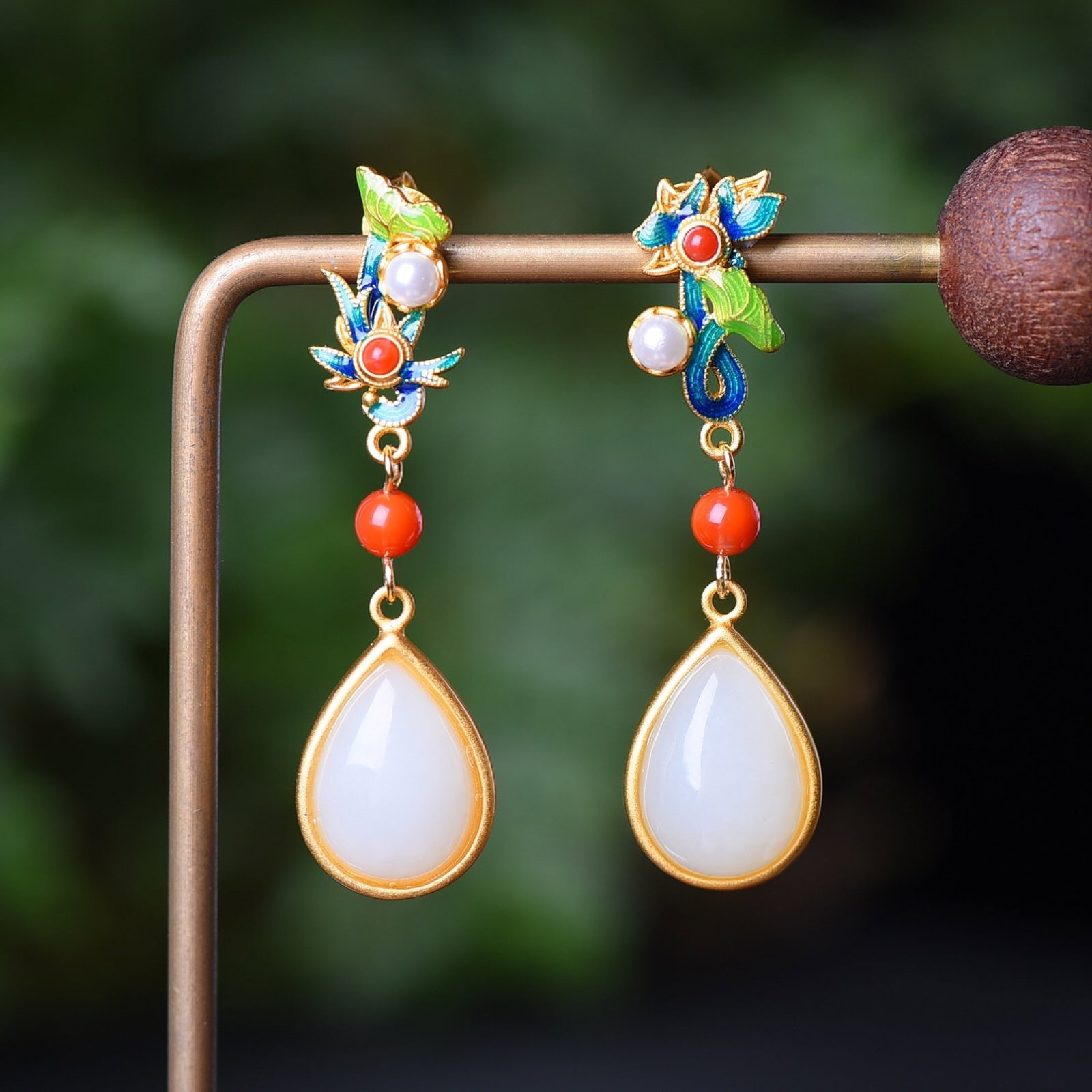 A Pair of Exquisite Sterling Silver-Gold Plated Inlaid White Jade Enamel Earrings: Estimated Value:300-600 A Pair of Exquisite Sterling Silver-Gold Plated Inlaid White Jade Enamel Earrings,Size:10mmx14mm