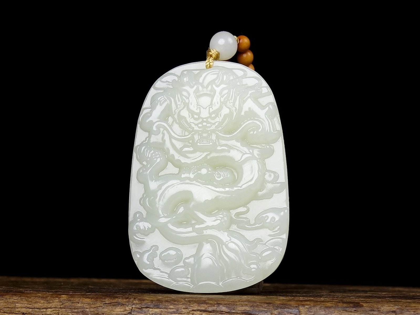 An Exquisite White Jade Dragon Pattern Pendant (1 of 5)