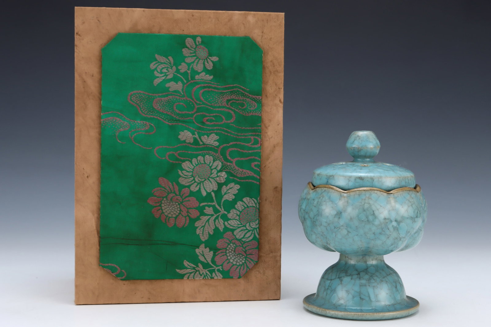An Exquisite Ru yao Sky Blue Glazed Cover with Gold Censer: Estimated Value:1200-2400 An Exquisite Ru yao Sky Blue Glazed Cover with Gold Censer,Song Dynasty,China,Royal Court Mark,Size:5.8inx4.3in
