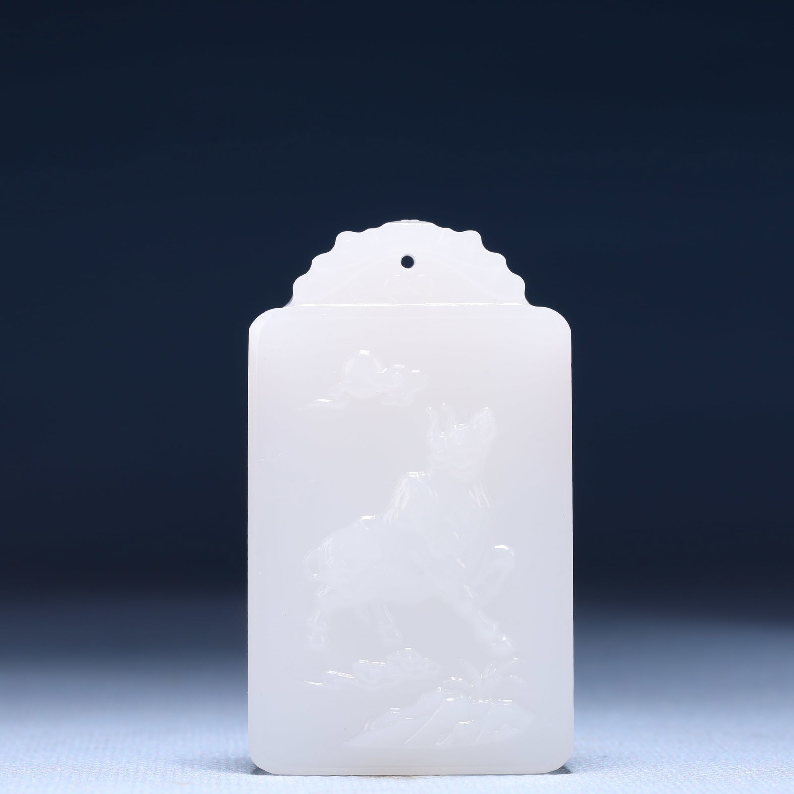 An Exquisite White Jade Buffalo Pattern Pendant: Estimated Value:380-800 An Exquisite White Jade Buffalo Pattern Pendant,Size:1.4inx0.4inx2.4in,Weight:51g 白玉牛纹牌