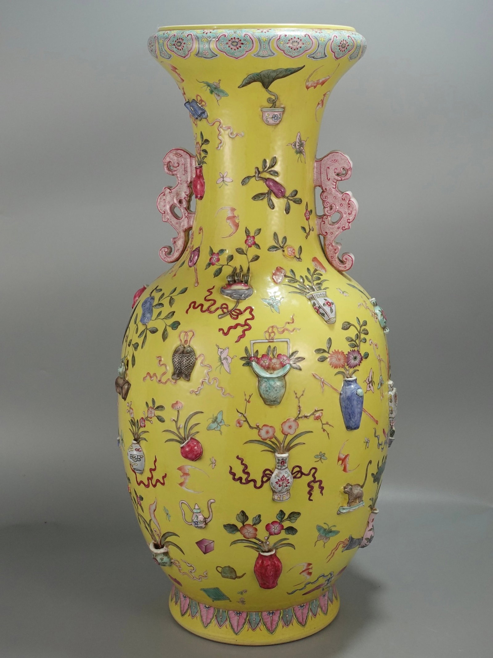 A Huge Yellow Ground Flower Pattern Double-Ears Vase: A Huge Yellow Ground Flower Pattern Double-Ears Vase,Qing Dynasty,China,Qianlong Six-character Mark,Size:29.9inx14.6in 黄地花卉纹双耳瓶,中国