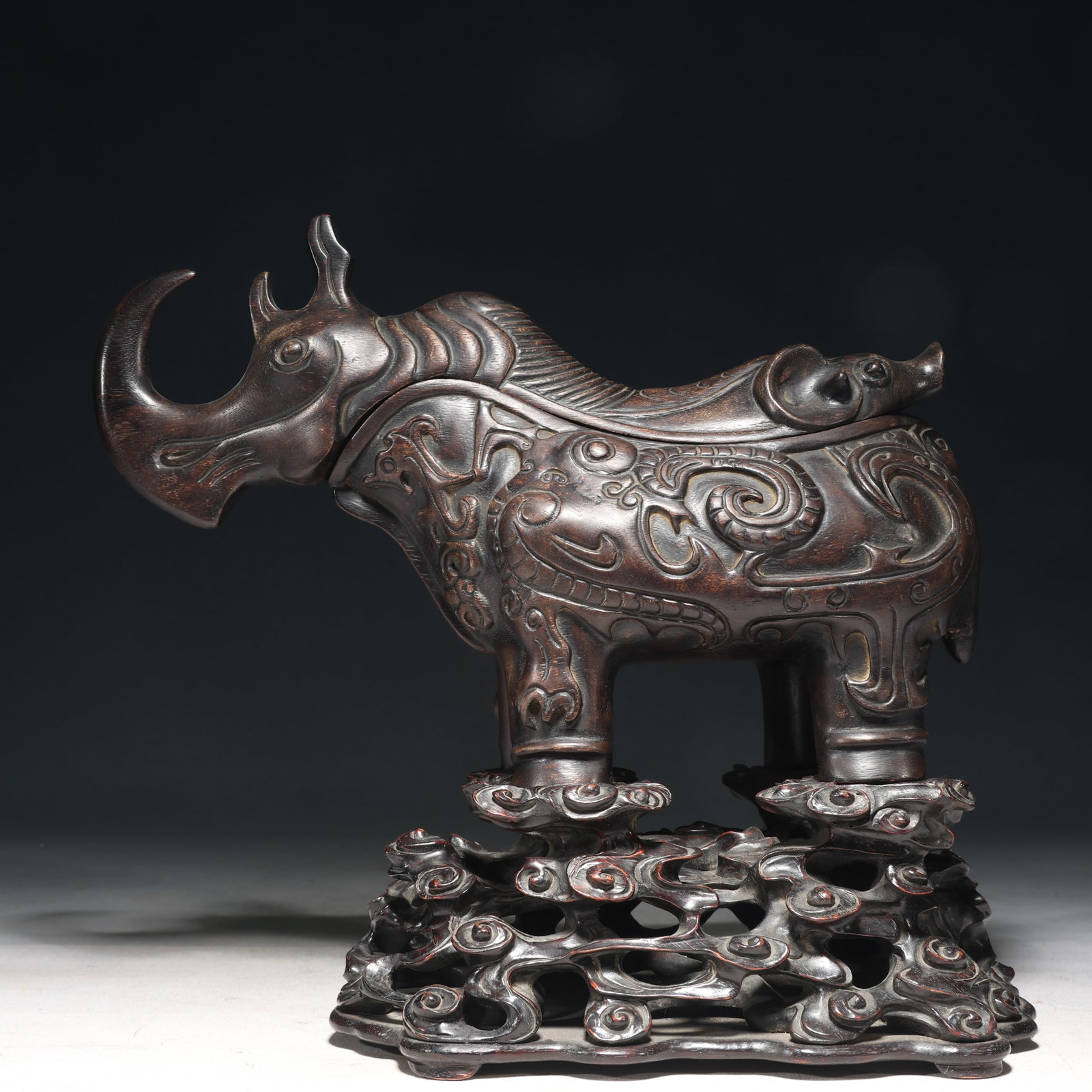 A Rare Eaglewood Rhinoceros Ornament,With Base: A Rare Eaglewood Rhinoceros Ornament,With Base,Qing Dynasty,China,Size:11.8inx5.5inx11in,Weight:950g