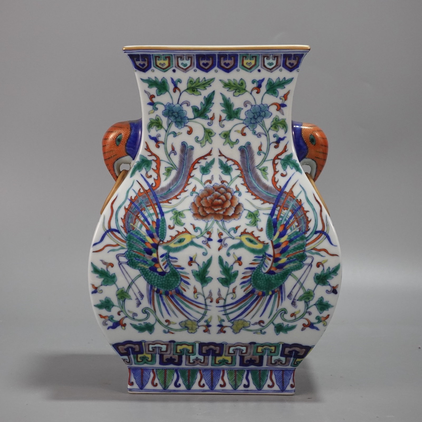 An Exquisite Doucai Flower and Phoenix Pattern Elephant-Ears Vase: An Exquisite Doucai Flower and Phoenix Pattern Elephant-Ears Vase,Qing Dynasty,China,Qianlong Six-character Mark,Size:10.6inx7.5in