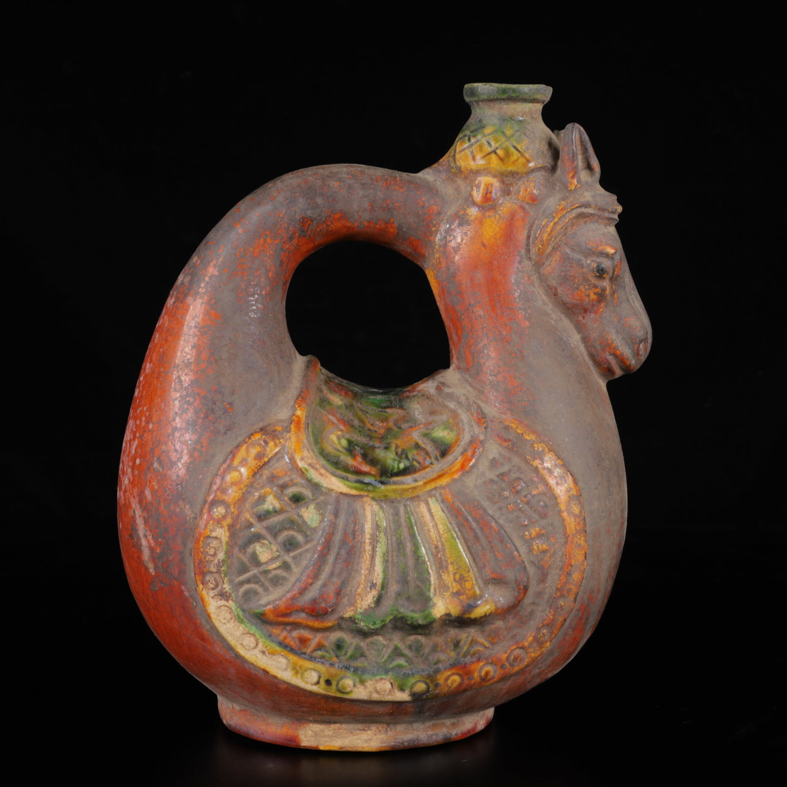 An Exquisite Tang Tri-Color Glazed Pottery Horse teapot: An Exquisite Tang Tri-Color Glazed Pottery Horse teapot,Tang Dynasty,China,Size:5.9inx4.3inx8.3in,Weight:840g 唐三彩马壶,中国唐代