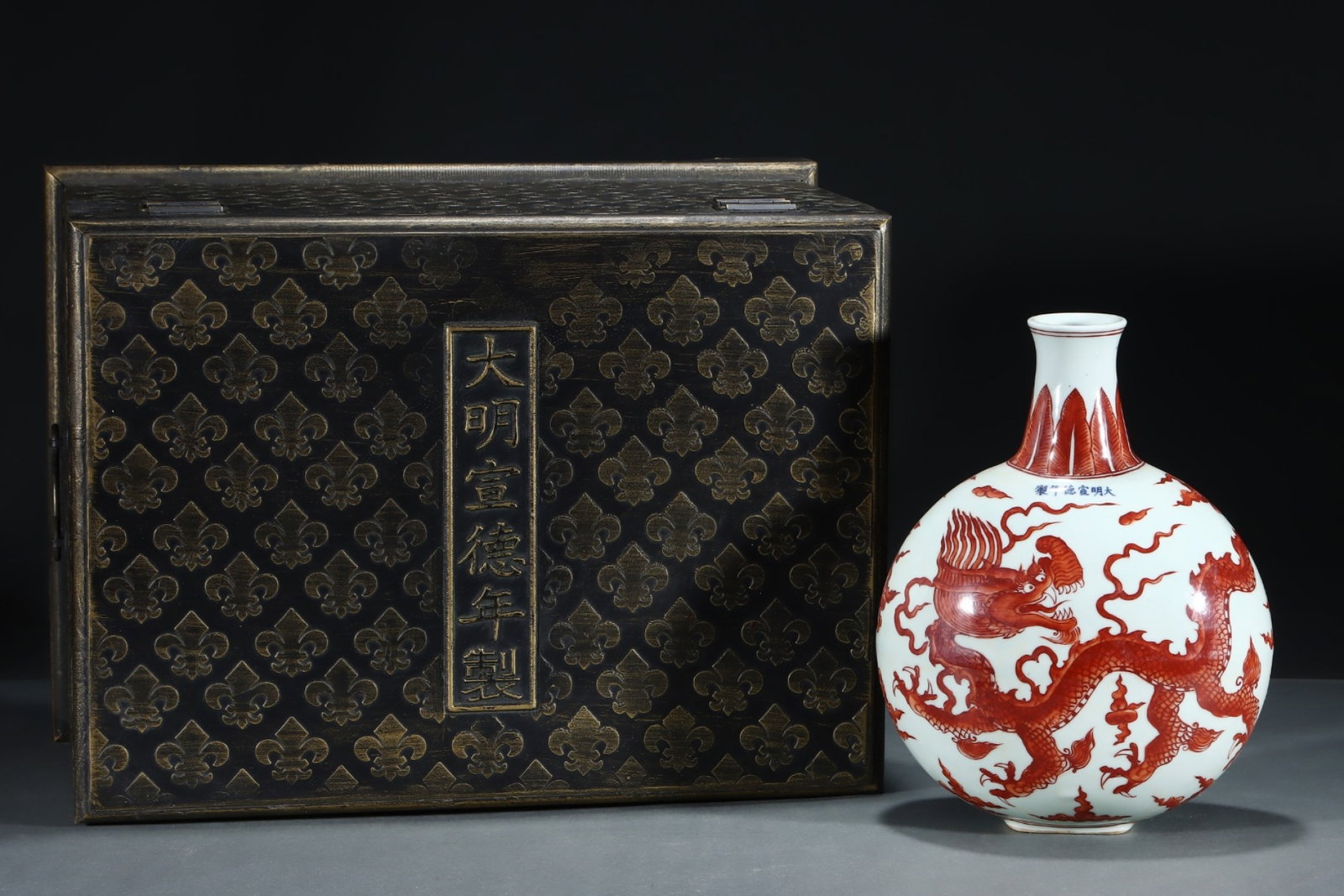 A Rare Red Glazed Auspicious Cloud and Dragon Vase: A Rare Red Glazed Auspicious Cloud and Dragon Vase,Ming Dynasty, China,Xuande Six-character Mark,Size:11.9inx8.7in
