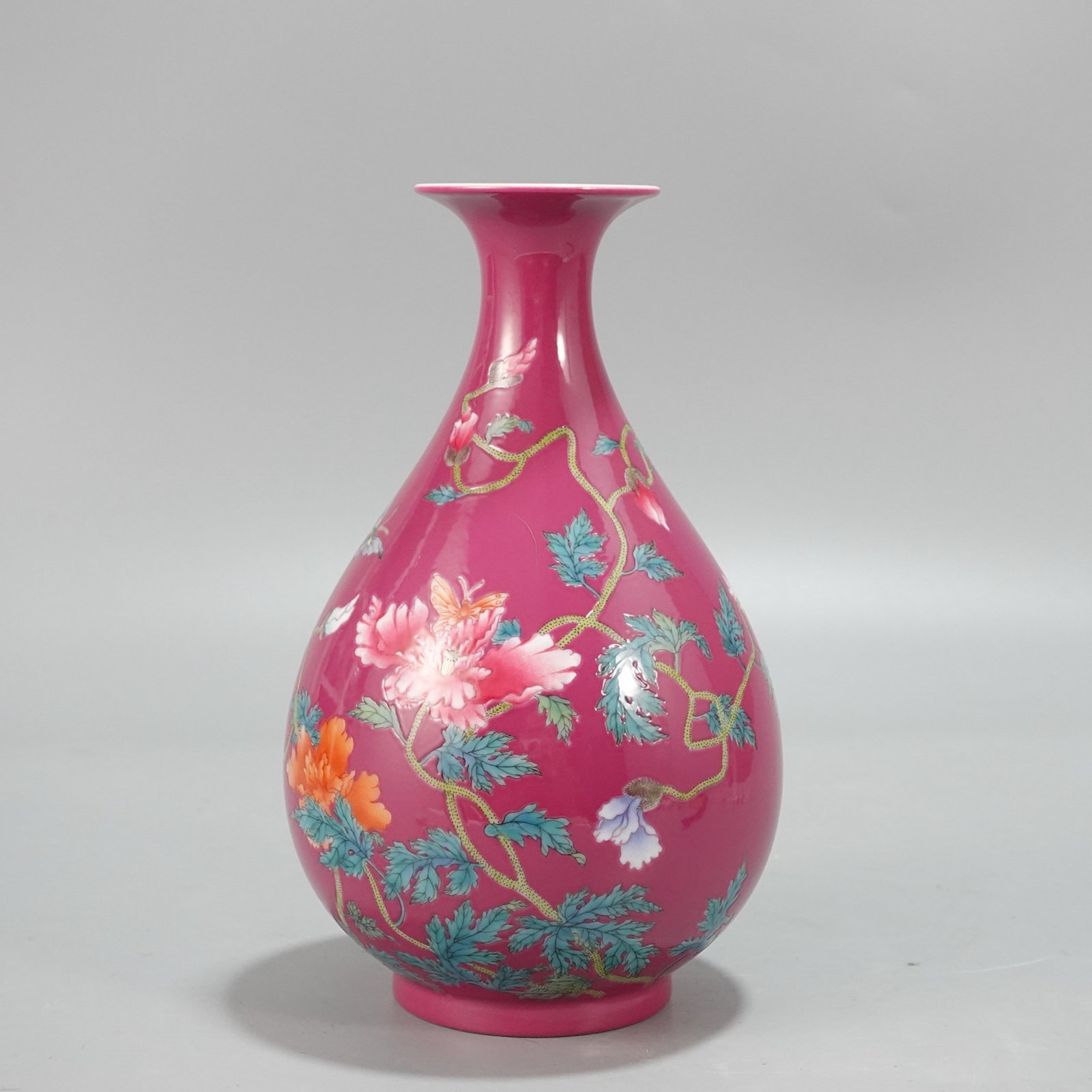 An Exquisite Ruby Red-Glazed Enamel Flower and Butterfly Pattern Vase,with poem: An Exquisite Ruby Red-Glazed Enamel Flower and Butterfly Pattern Vase,with poem,Qing Dynasty,China,Yongzheng Six-character Mark,Size:7.9inx4.7in 胭脂红珐琅彩花