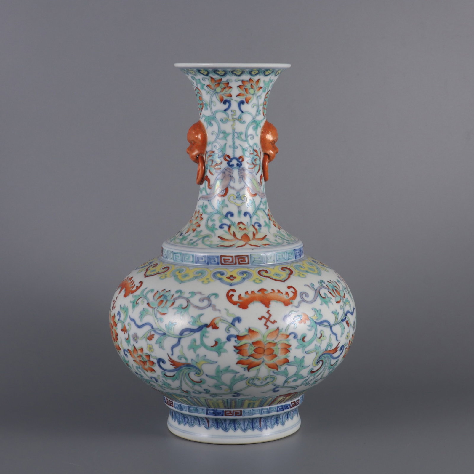 An Exquisite Doucai Flower Pattern Beast-Ears Vase: An Exquisite Doucai Flower Pattern Beast-Ears Vase,Qing Dynasty,China,Qianlong Six-character Mark,Size:11.7inx7.3in