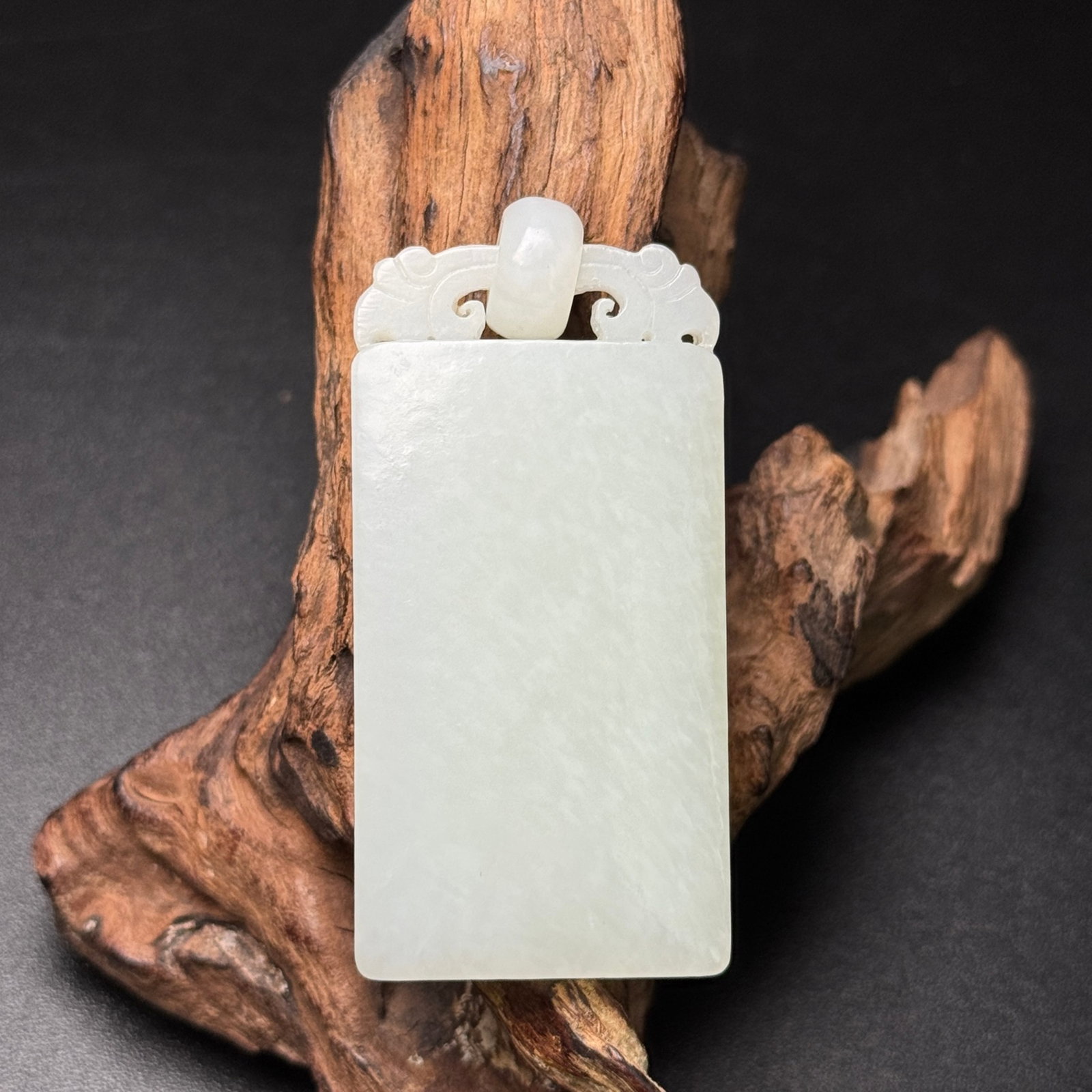An Exquisite White Jade Pendant: An Exquisite White Jade Pendant,Qing Dynasty,China,Size:2.5inx1.2inx0.5in,Weight:54g 白玉挂件,中国清代