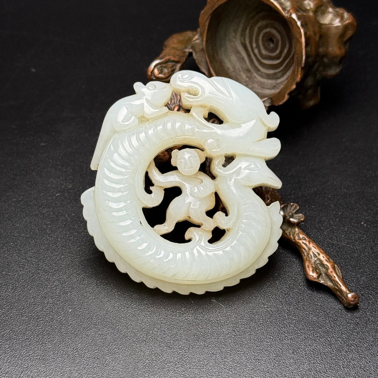 An Exquisite White Jade Figure Pendant: An Exquisite White Jade Figure Pendant,Qing Dynasty,China,Size:2.2inx2inx0.5in,Weight:58g 白玉人物佩,中国清代