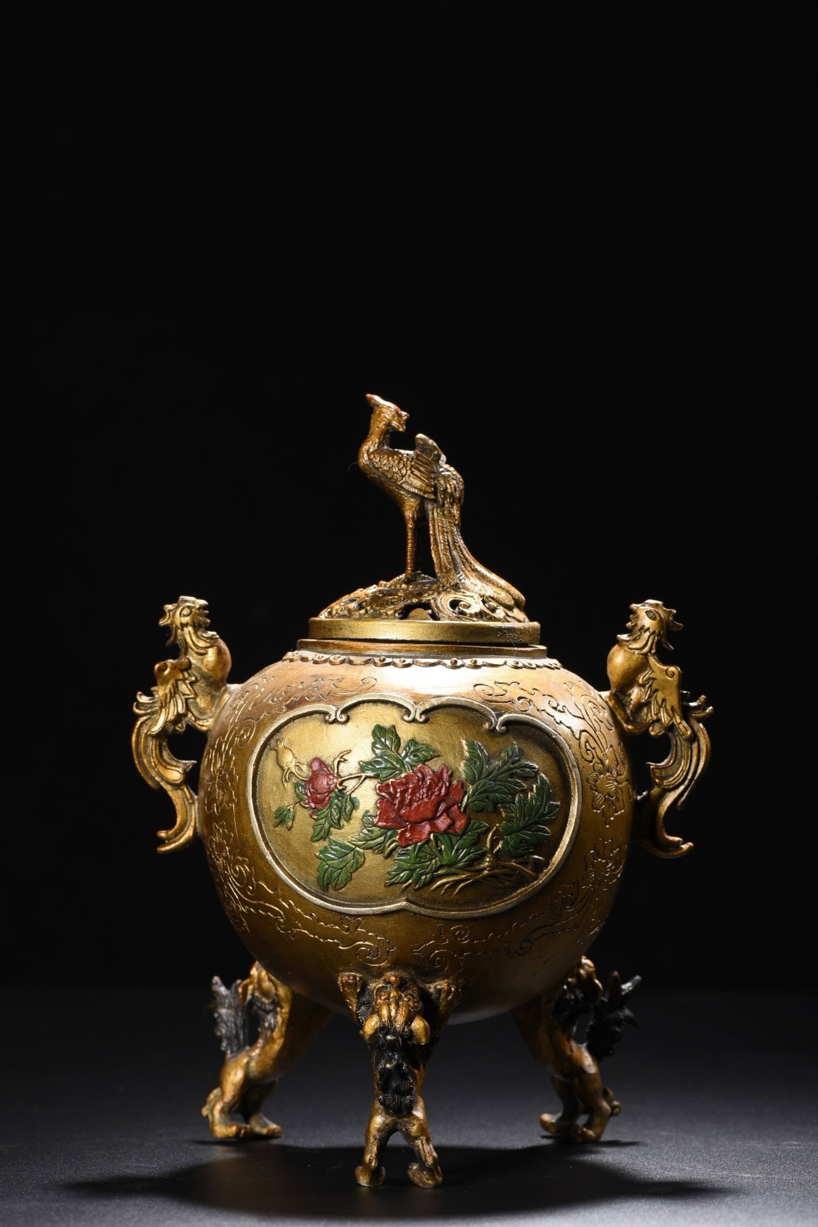 An Exquisite Bronze Painted Color Flower Pattern Phoenix-Ears Tripod Censer: An Exquisite Bronze Painted Color Flower Pattern Phoenix-Ears Tripod Censer,Qing Dynasty,China,Size:8.7inx6.7in,Weight:1120g 铜彩绘花卉纹凤耳三