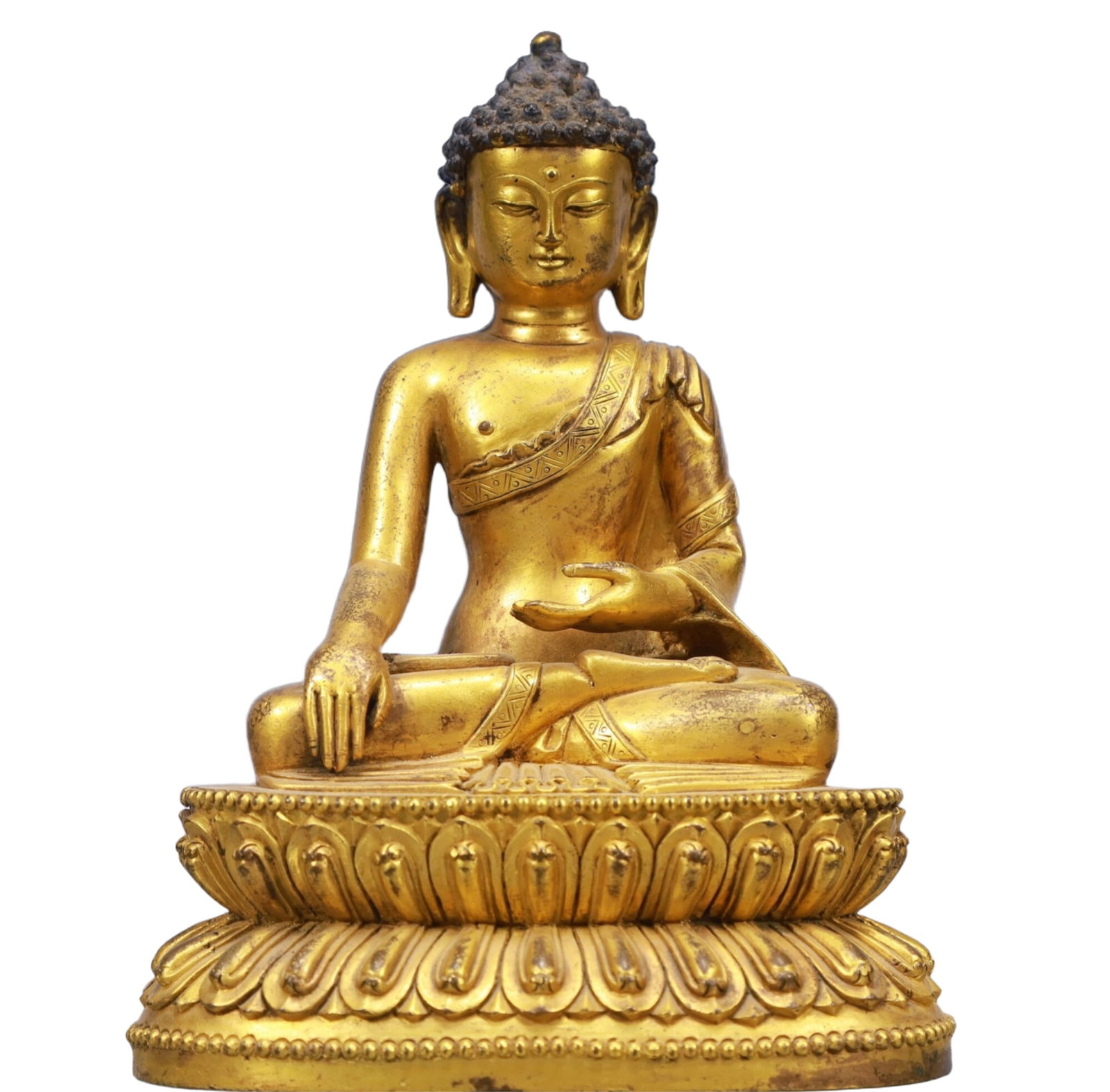 A Solemn Gilt Bronze Statue of Sakyamuni: A Solemn Gilt Bronze Statue of Sakyamuni,Qing Dynasty, China,Size:5.5inx3.9inx7.5in,Weight:1900g 铜鎏金如来像,中国清代
