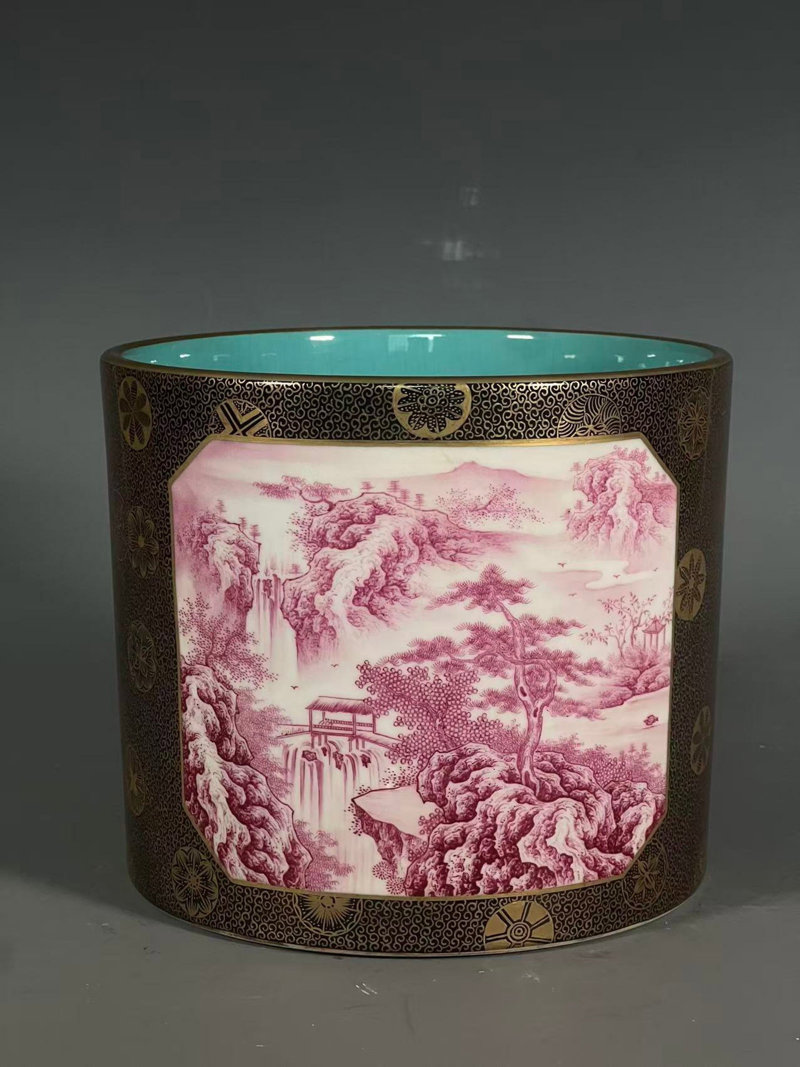 An Exquisite Ugyen Glazed Ruby Red-Glazed Painted Gold Landscape Pattern Brush Pot: An Exquisite Ugyen Glazed Ruby Red-Glazed Painted Gold Landscape Pattern Brush Pot,Qing Dynasty,China,Qianlong Six-character Mark,Size:6.5inx7.6in 乌金釉胭脂红ÿ