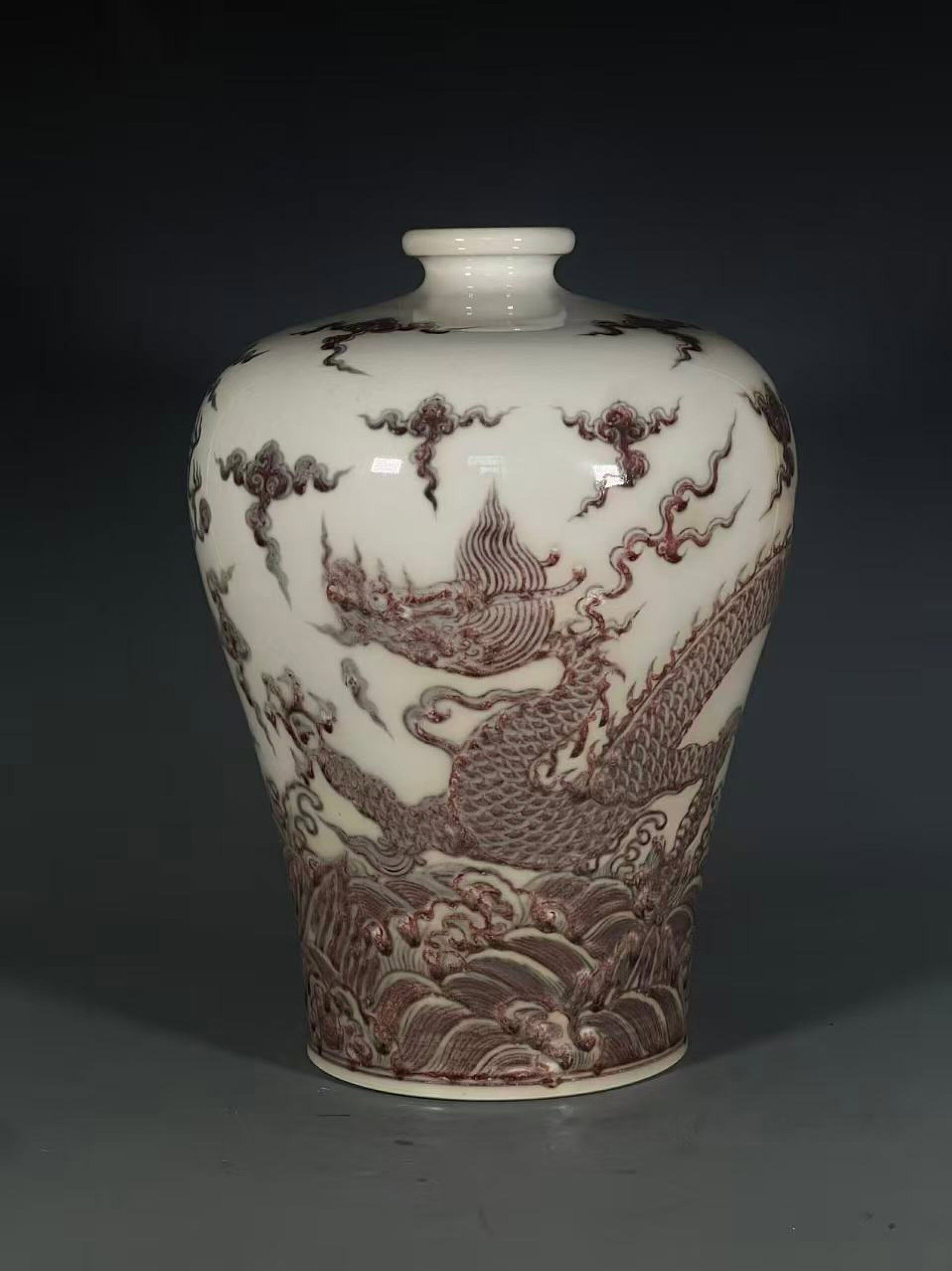 A Rare Underglaze-Red Seawater and Dragon Pattern Vase: A Rare Underglaze-Red Seawater and Dragon Pattern Vase,Qing Dynasty,China,Qianlong Six-character Mark,Size:13inx6in 釉里红海水龙纹瓶,中国