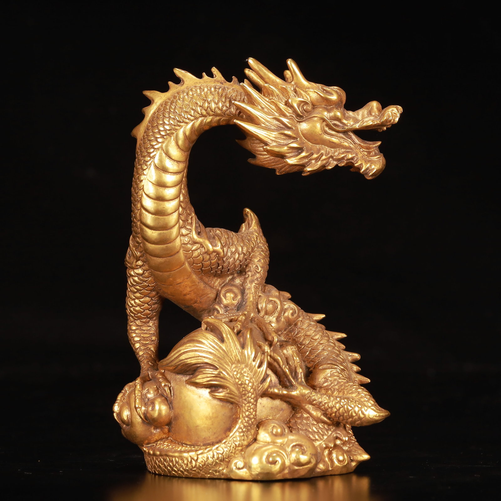 An Exquisite Gilt Bronze Dragon Ornament: An Exquisite Gilt Bronze Dragon Ornament,Qing Dynasty, China,Size:3.9inx3.5inx5.5in,Weight:1250g 铜鎏金龙摆件,中国清代