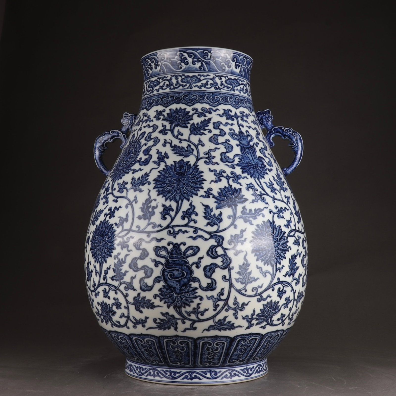 A Huge Blue and White Lotus Pattern Double-Ears Jar: A Huge Blue and White Lotus Pattern Double-Ears Jar,Qing Dynasty,China,Qianlong Six-character Mark,Size:22.2inx15.4in 青花缠枝莲纹双耳罐,中&