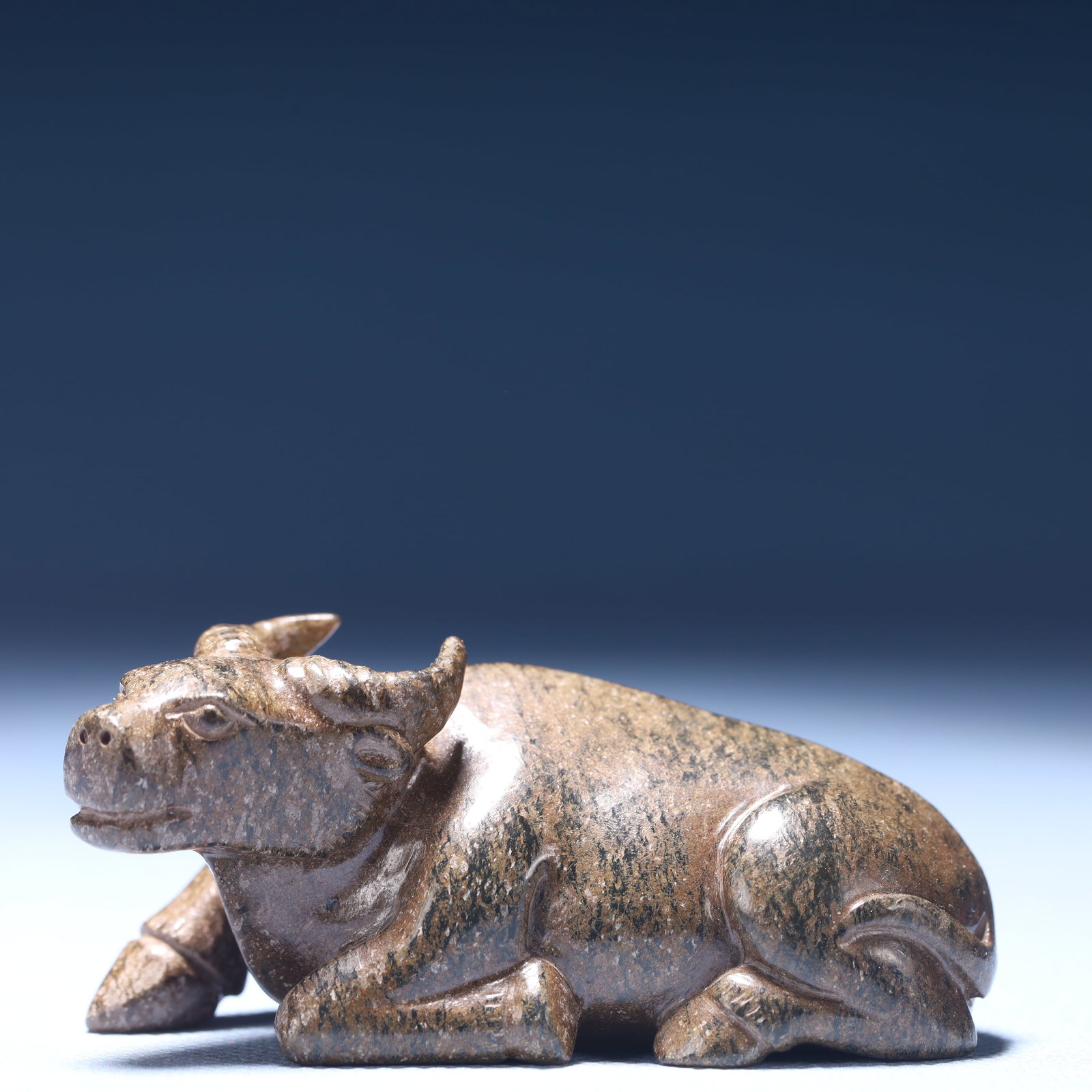 An Exquisite Archaic Jade Buffalo Ornament: An Exquisite Archaic Jade Buffalo Ornament,Ancient Time,China,Size:3inx1.6inx1.2in,Weight:100g 高古玉牛摆件,中国远古时期