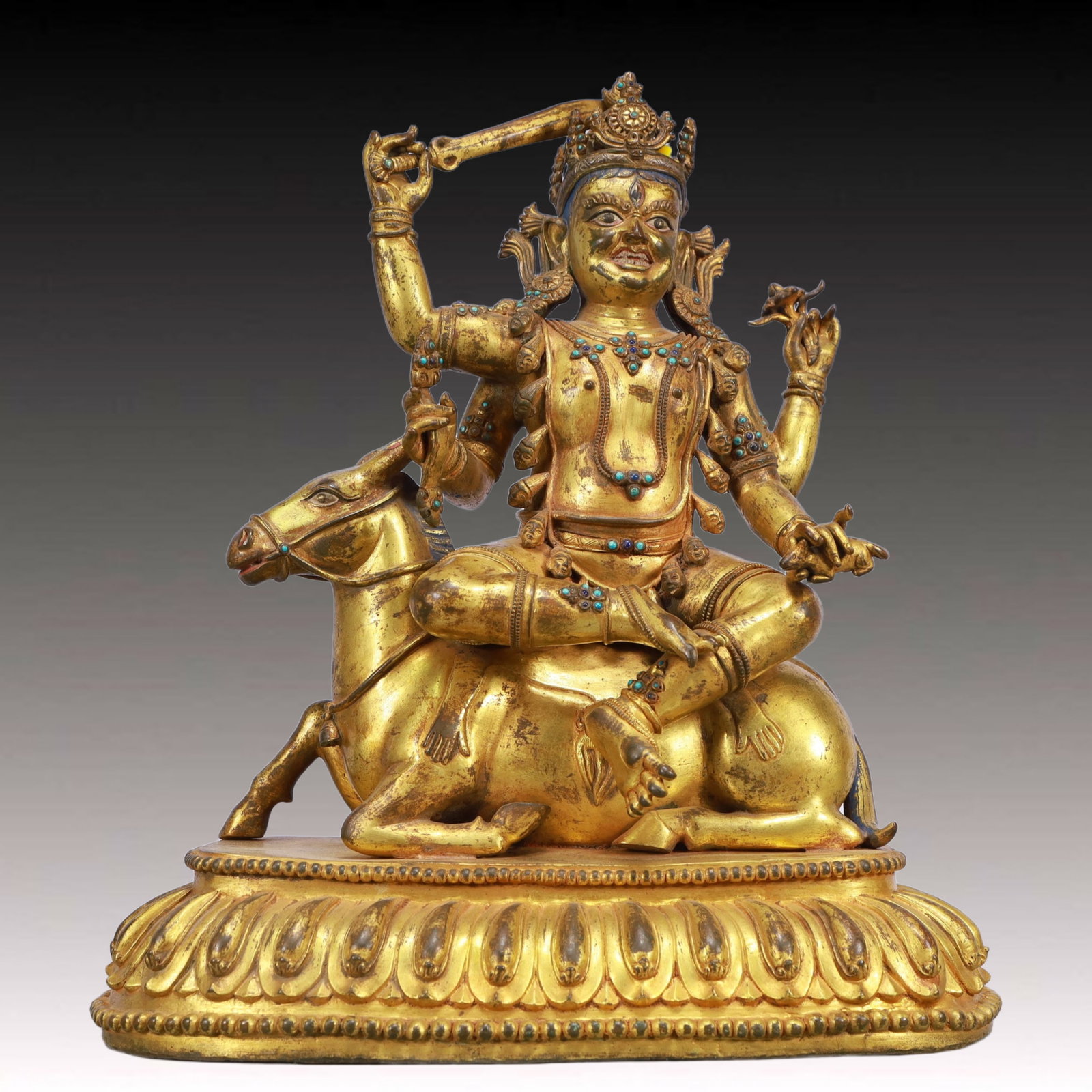 A Solemn Gilt Bronze Statue of Manjusri,Inlaid Turquoise: A Solemn Gilt Bronze Statue of Manjusri,Inlaid Turquoise,Ming Dynasty, China,Size:14.6inx8.3inx16.5in,Weight:11450g 铜鎏金文殊菩萨像,嵌绿