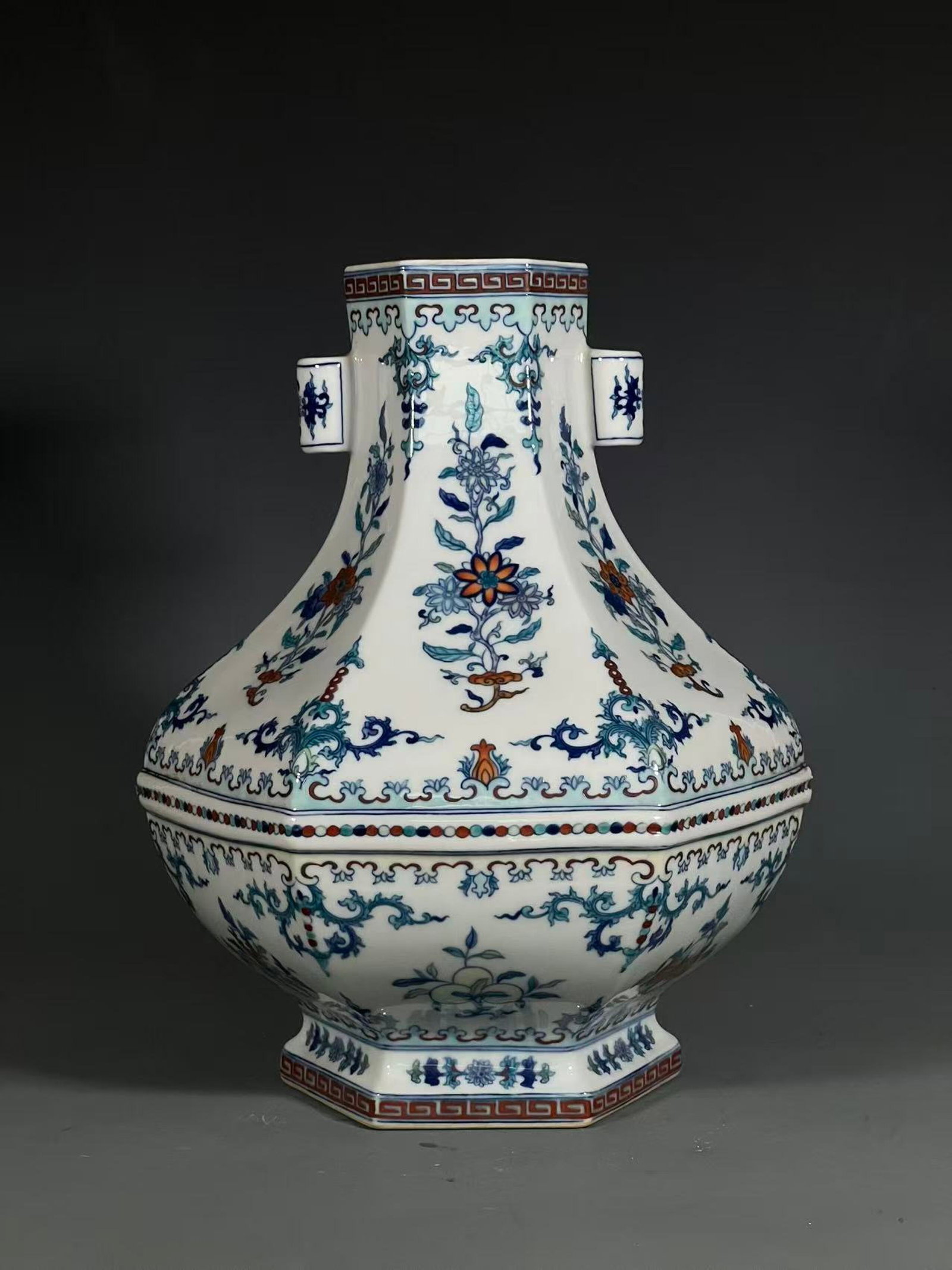 A Rare Doucai Flower Pattern Double-Ears Vase: A Rare Doucai Flower Pattern Double-Ears Vase,Qing Dynasty,China,Qianlong Six-character Mark,Size:13.1inx5.7in