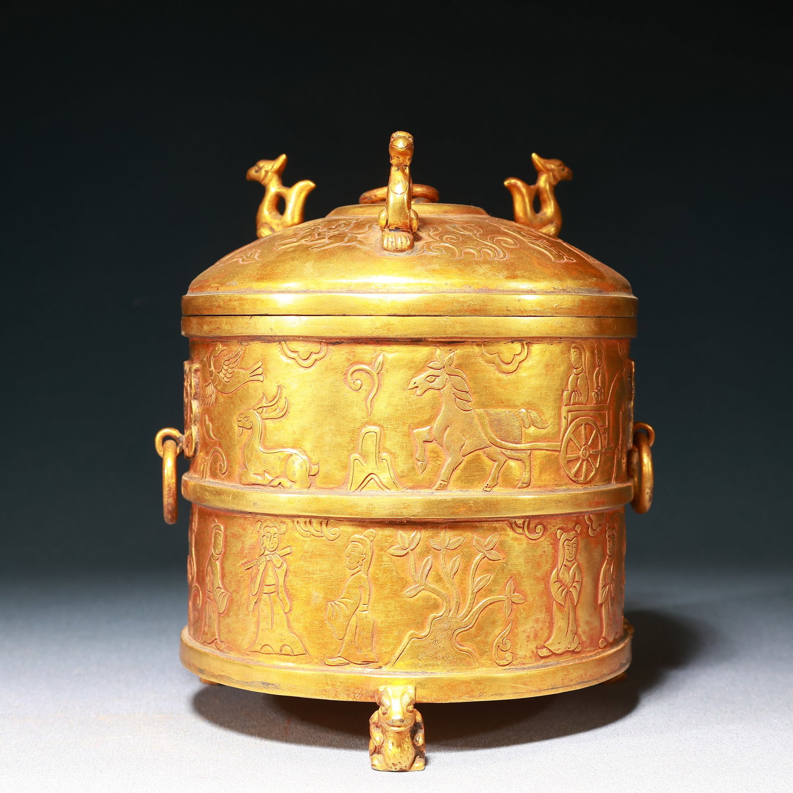 An Exquisite Gilt Bronze Character and Story Pattern Beast-Ears Tripod Jar with Cover: An Exquisite Gilt Bronze Character and Story Pattern Beast-Ears Tripod Jar with Cover,Qing Dynasty,China,Size:5.7inx6.7in,Weight:1250g