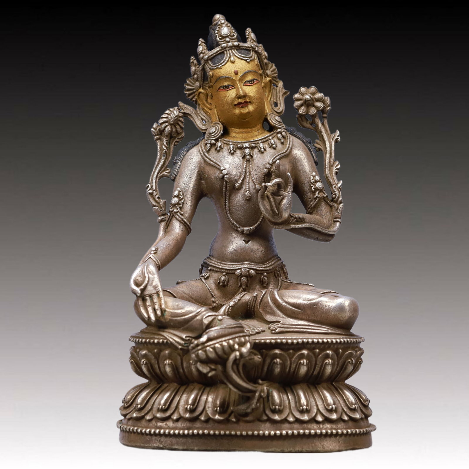 A Solemn Bronze Inlaid Gold and Silver Statue of Tara: A Solemn Bronze Inlaid Gold and Silver Statue of Tara,Ming Dynasty, China,Size:4.7inx4.3inx9.3inWeight:1500g 铜鎏金度母像,中国明代