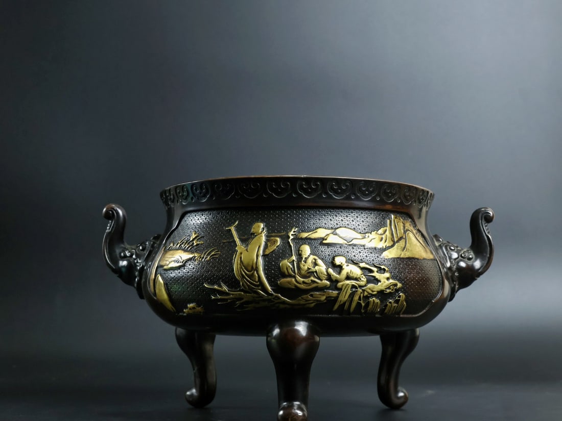 An Exquisite Gilt Bronze Landscape and Figure Pattern Elephant-Ears Tripod Censer: An Exquisite Gilt Bronze Landscape and Figure Pattern Elephant-Ears Tripod Censer,Ming Dynasty, China, Xuande Six-character Mark,Size:6.9inx6.9in,Weight:3630g 铜鎏金山水&