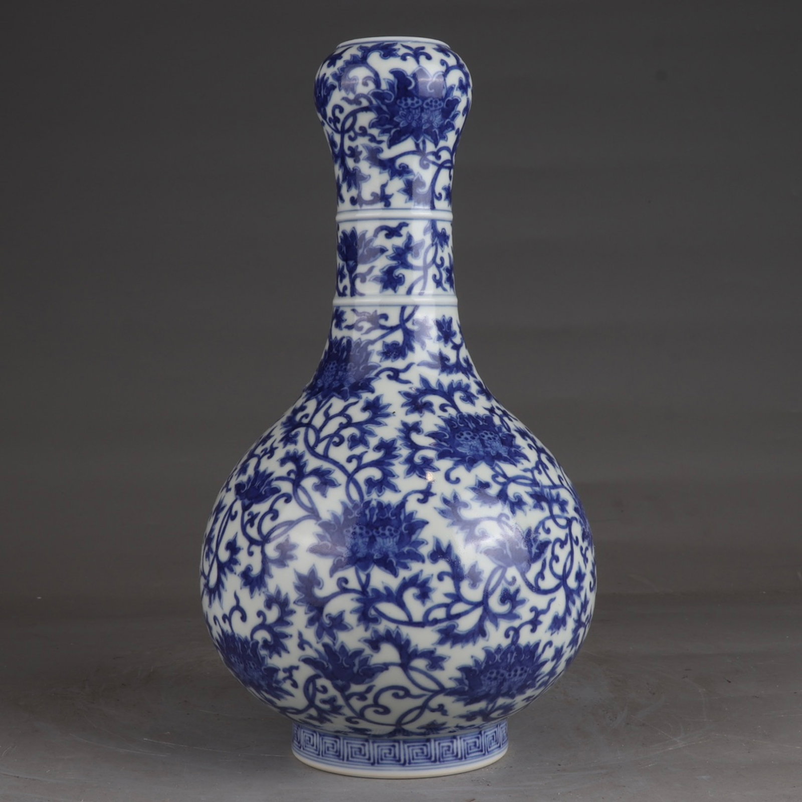 An Exquisite Blue and White Lotus Pattern Vase: An Exquisite Blue and White Lotus Pattern Vase,Qing Dynasty,China,Qianlong Six-character Mark,Size:11.3inx6.3in 青花缠枝莲纹瓶,中国清代