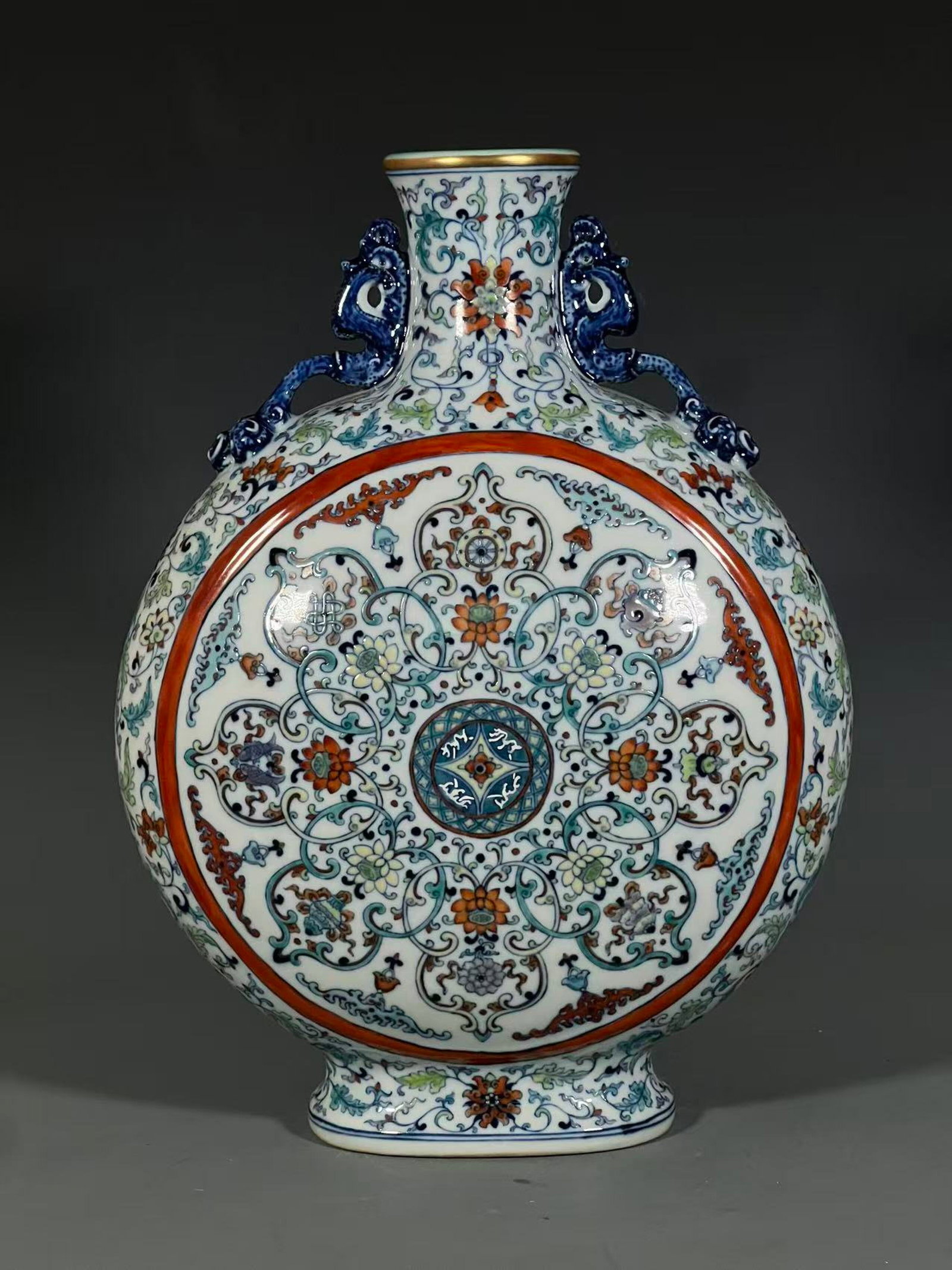 A Huge Doucai Lotus Pattern Double-Ears Vase: A Huge Doucai Lotus Pattern Double-Ears Vase,Qing Dynasty,China,Qianlong Six-character Mark,Size:16.4inx6.1in 斗彩缠枝莲纹双耳瓶,中国&