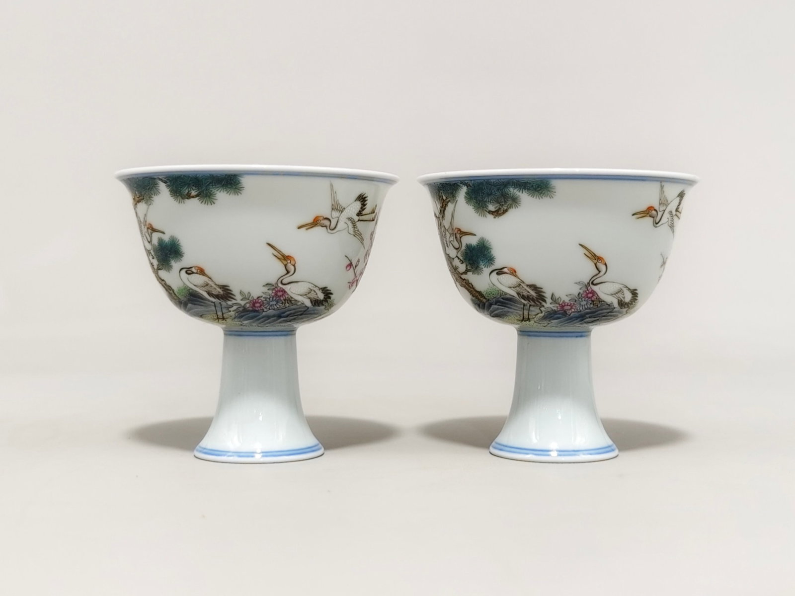 A Pair of Exquisite Famille-Rose Pine and Crane Pattern Stem Cups: A Pair of Exquisite Famille-Rose Pine and Crane Pattern Stem Cup,Qing Dynasty,China,Yongzheng Six-character Mark,Size:3.1inx3.1ins 一对粉彩松鹤纹高Ū