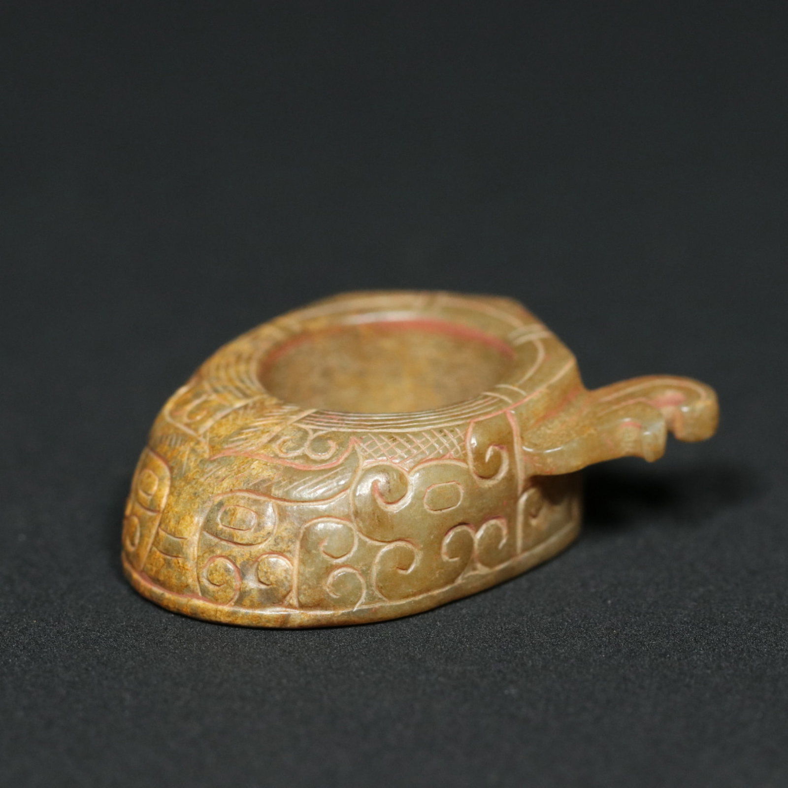 An Exquisite Archaic Jade Beast-Face Pattern Thumb Ring: An Exquisite Archaic Jade Beast-Face Pattern Thumb Ring,Han Dynasty,China,Size:1.6inx1.5inx0.6in,Weight:24.2g