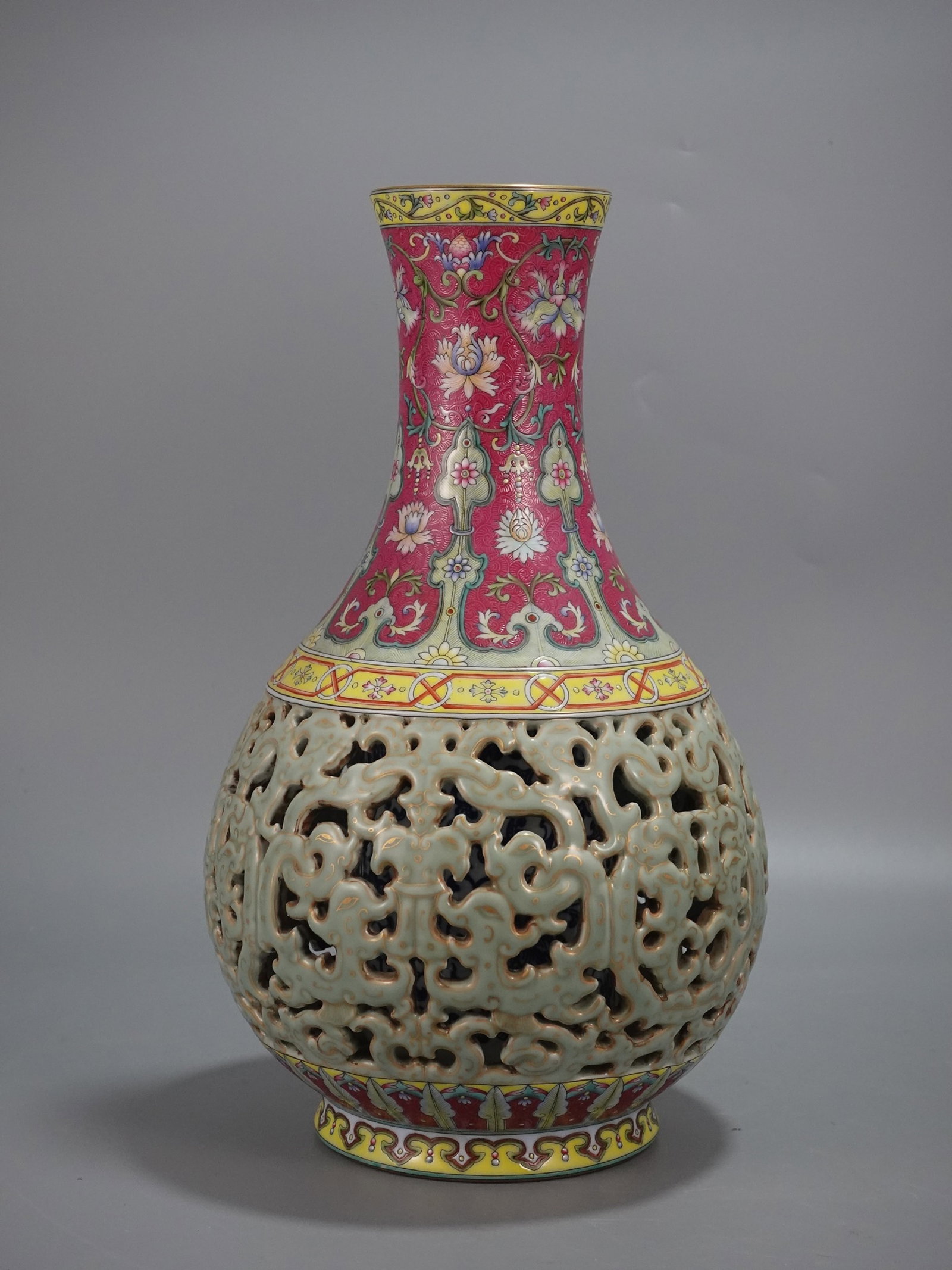 A Rare Famille-Rose Painted Gold Hollow Flower Pattern Vase: A Rare Famille-Rose Painted Gold Hollow Flower Pattern Vase,Qing Dynasty,China,Qianlong Six-character Mark,Size:15.2inx8.5in