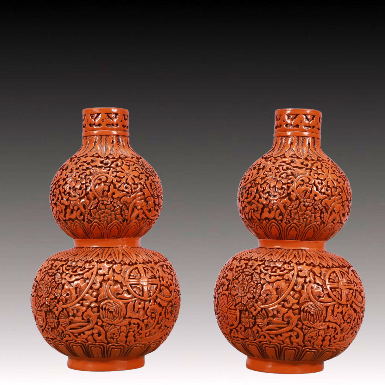 A Pair of Exquisite Carved Red Lacquer Flower Pattern Vases: A Pair of Exquisite Carved Red Lacquer Flower Pattern Vases,Qing Dynasty, China,Qianlong Six-character Mark,Size:5.7inx10.2in,Total Weight:1350g 一对剔红漆器花