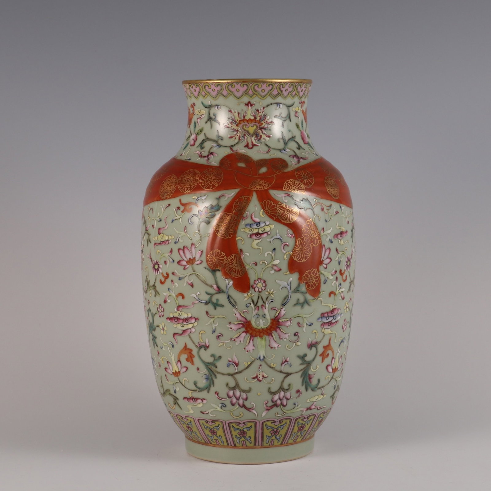 A Rare Celadon Glazed Famille-Rose Painted Gold Lotus Pattern Vase: A Rare Celadon Glazed Famille-Rose Painted Gold Lotus Pattern Vase,Qing Dynasty,China,Jiaqing Six-character Mark,Size:12.1inx6.5in 青釉粉彩描金缠枝ő