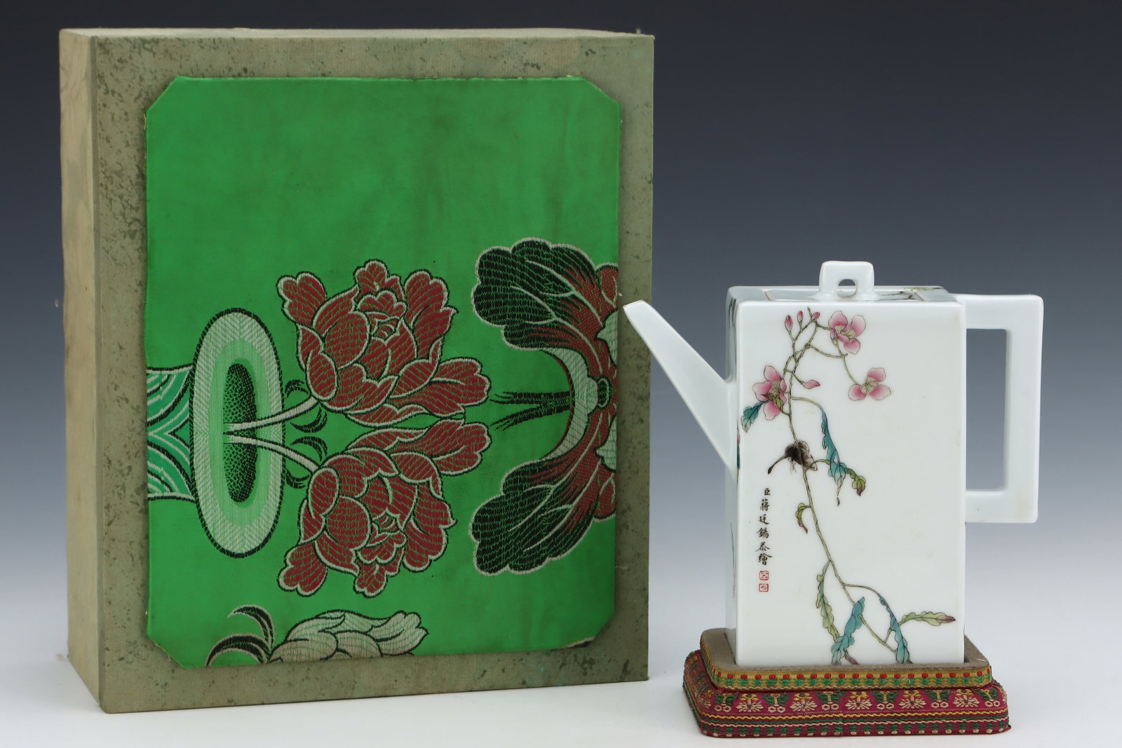 An Exquisite Famille-Rose Flower and Butterfly Pattern Teapot: An Exquisite Famille-Rose Flower and Butterfly Pattern Teapot,Qing Dynasty,China,With Mark,Size:7.7inx7.9in 粉彩花卉蝴蝶纹茶壶,中国