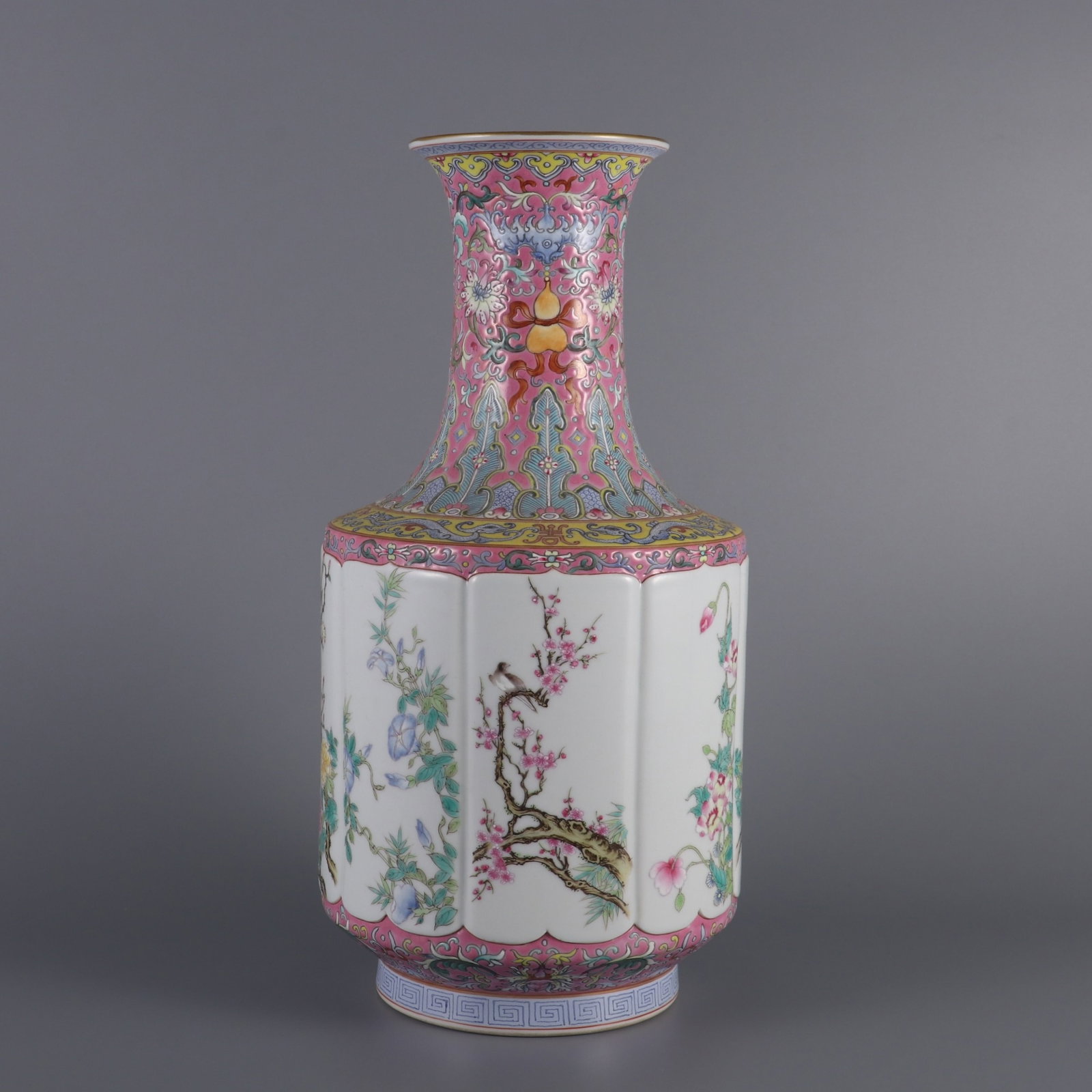 A Rare Famille-Rose Flower and Bird Pattern Vase: A Rare Famille-Rose Flower and Bird Pattern Vase,Qing Dynasty,China,Qianlong Six-character Mark,Size:13.3inx6.3in 粉彩花鸟纹瓶,中国清代,