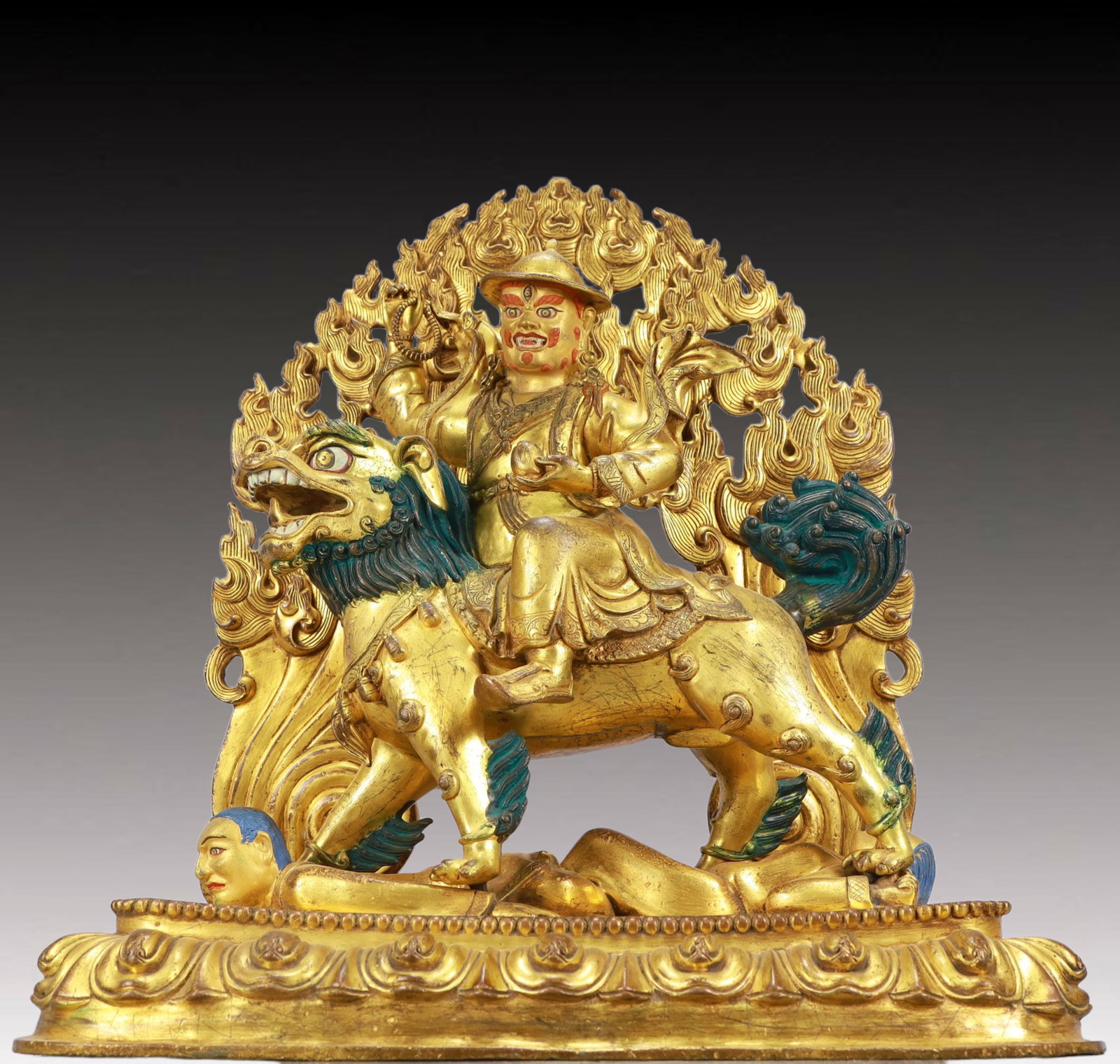 A Solemn Gilt Bronze Statue of Mammon Rides the Lion: A Solemn Gilt Bronze Statue of Mammon Rides the Lion ,Ming Dynasty, China,Size:17.3inx8.7inx18.5in Weight:19300g 铜鎏金骑狮财神像,中国਴