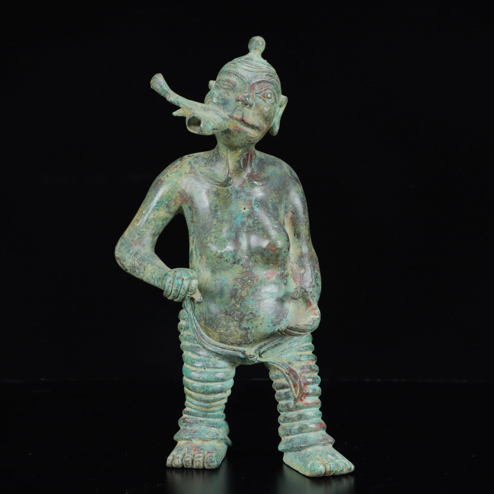 An Archaic Bronze Figure Ornament: An Archaic Bronze Figure Ornament,the Warring States Period in China,Size:5.5inx2.8inx11.8in,Weight:2000g
