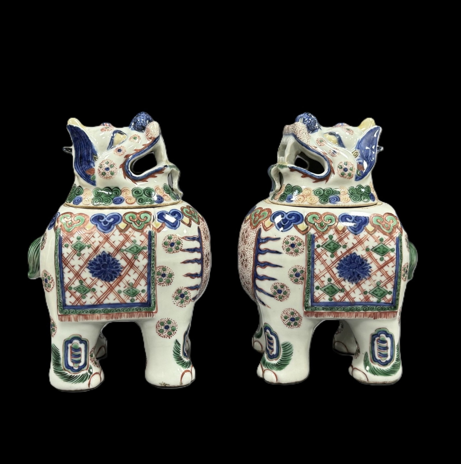 A Pair of Exquisite Blue and White Wucai Lotus Pattern Auspicious Beast Ornaments: A Pair of Exquisite Blue and White Wucai Lotus Pattern Auspicious Beast Ornaments,Ming Dynasty,China,Wanli Six-character Mark,Size:7.5inx5.1in