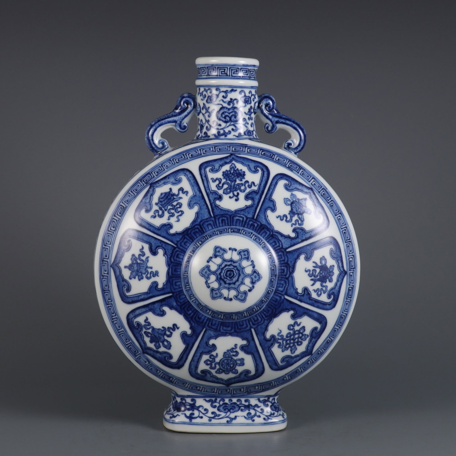 A Rare Blue and White Lotus Pattern Double-Ears Vase: A Rare Blue and White Lotus Pattern Double-Ears Vase,Qing Dynasty,China,Qianlong Six-character Mark,Size:12.8inx9.1in 青花缠枝莲纹双耳瓶,中&