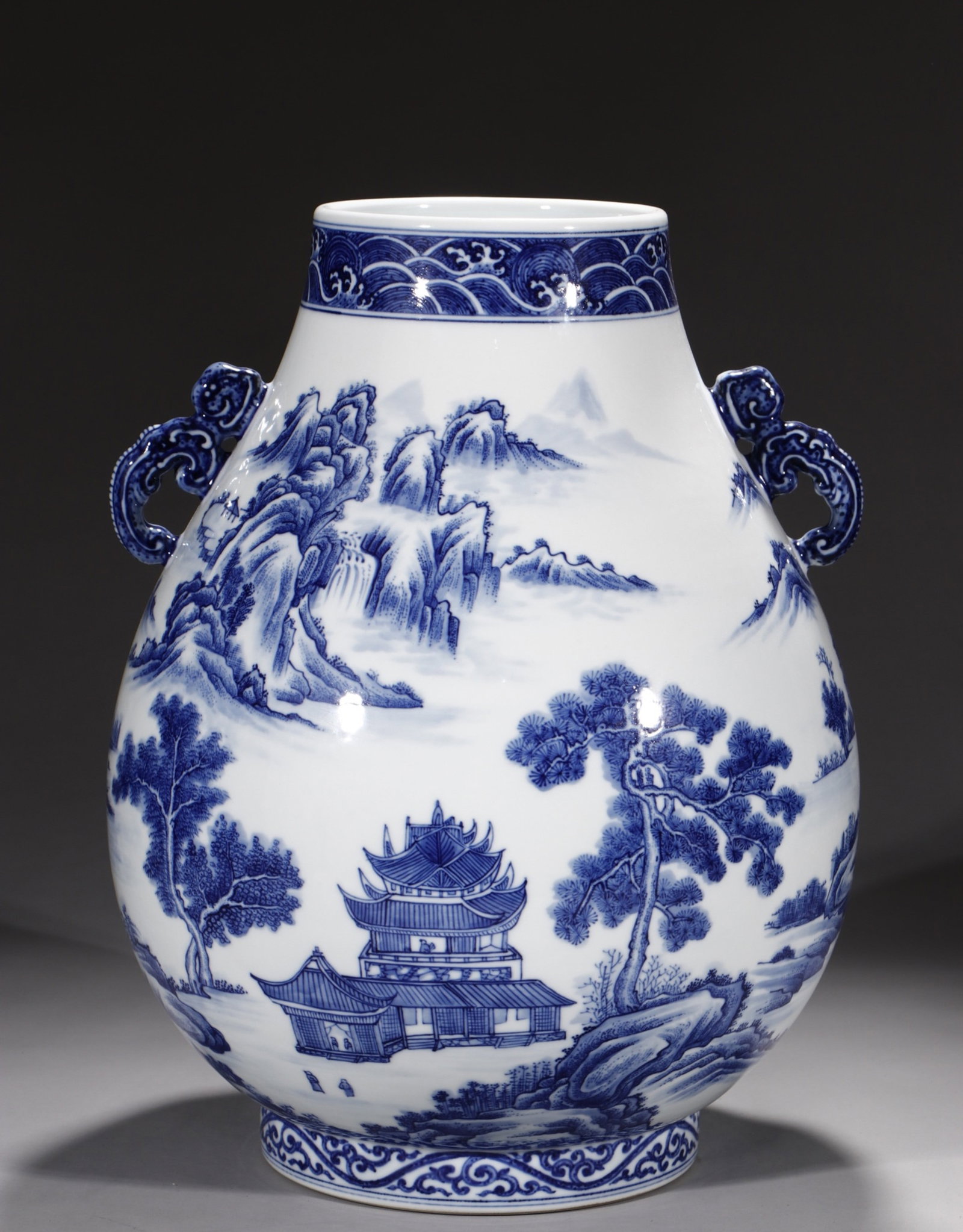 A Rare Blue and White Landscape Pattern Double-Ears Vase: A Rare Blue and White Landscape Pattern Double-Ears Vase,Qing Dynasty,China,Qianlong Six-character Mark,Size:14.4in