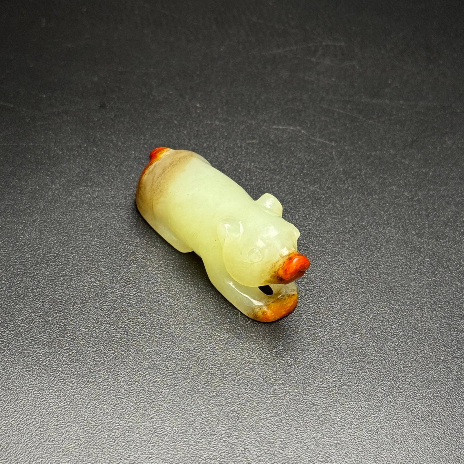An Exquisite White Jade Bear Ornament: An Exquisite White Jade Bear Ornament,Qing Dynasty,China,Size:1.9inx0.8inx0.7in,Weight:31g 白玉熊摆件,中国清代