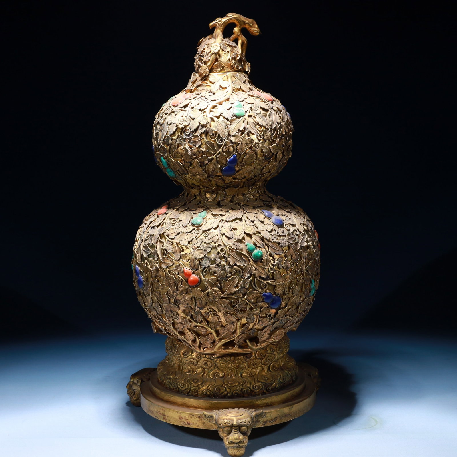 An Exquisite Gilt Bronze Bats and Peach Pattern Gourd-Shaped Vase,with Base: An Exquisite Gilt Bronze Bats and Peach Pattern Gourd-Shaped Vase,with Base,Qing Dynasty,China,Size:9.8inx20.5inx9.8in,Weight:8350g 铜鎏金福寿纹葫芦