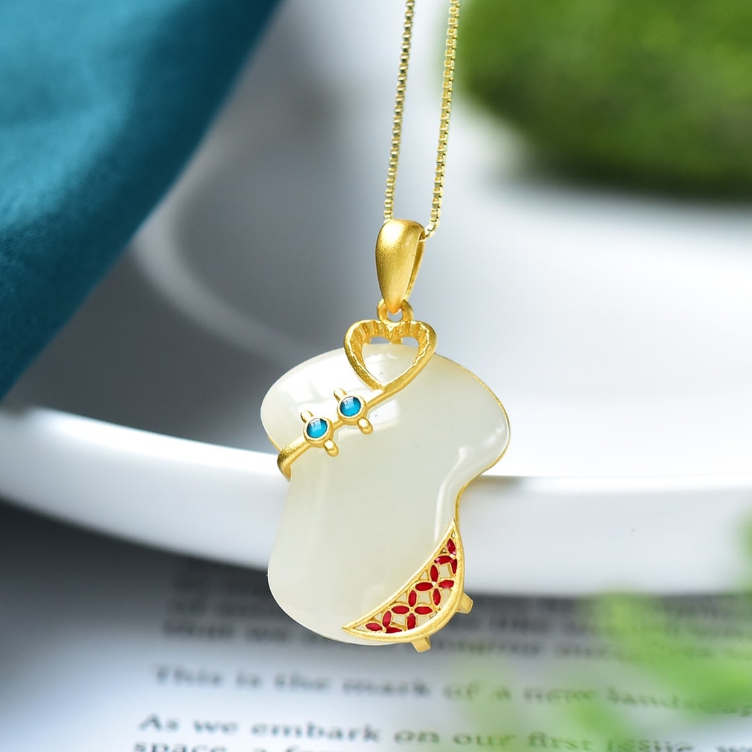 An Exquisite Sterling Silver-Gold Plated Inlaid White Jade Pendant: An Exquisite Sterling Silver-Gold Plated Inlaid White Jade Pendant 纯银镀金镶白玉吊坠