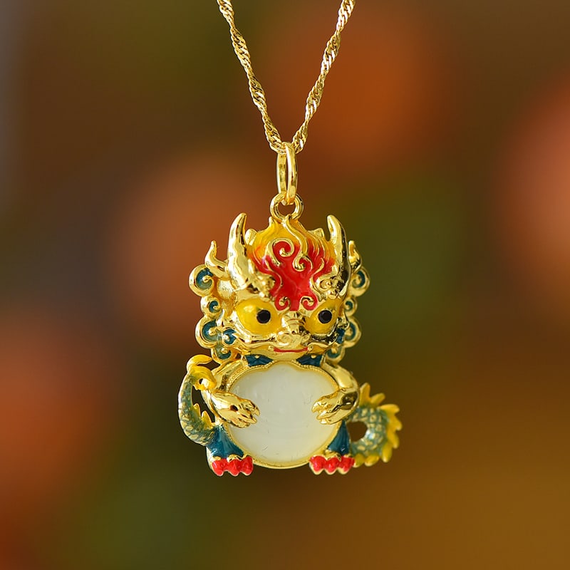 An Exquisite Sterling Silver-Gold Plated Inlaid White Jade Pendant: An Exquisite Sterling Silver-Gold Plated Inlaid White Jade Pendant,Size:0.4inx0.5in 纯银镀金镶白玉吊坠