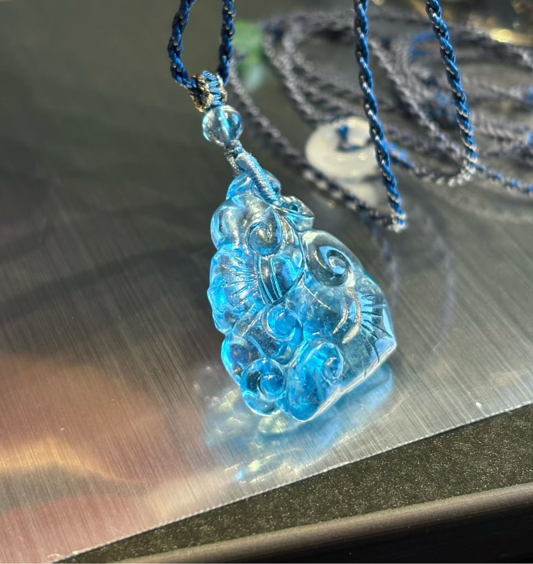An Exquisite Aquamarine Ruyi Necklace: An Exquisite Aquamarine Ruyi Necklace,Size:1inx0.8inx0.3in,Weight:6.3g 海蓝宝如意吊坠