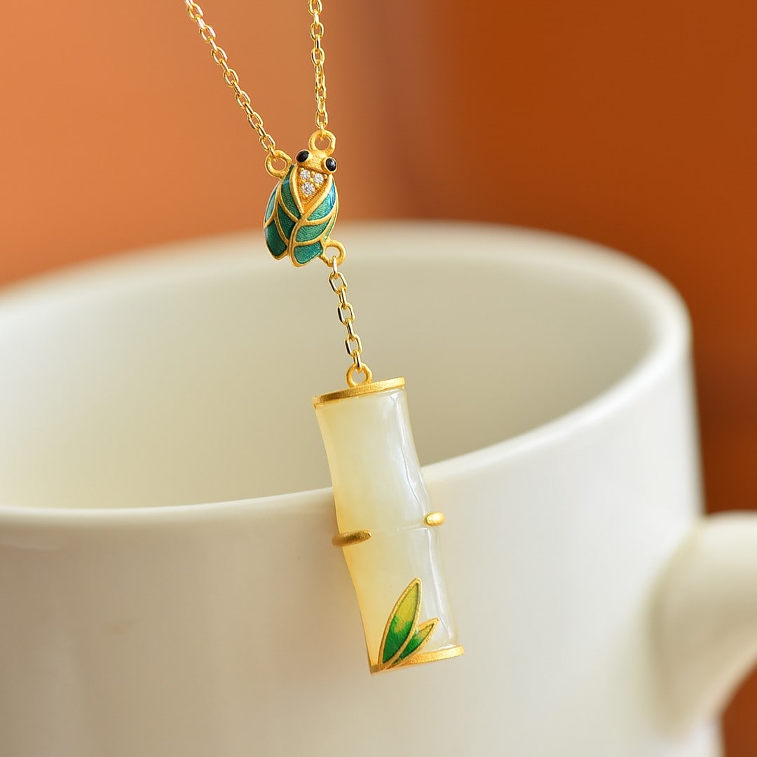 An Exquisite Sterling Silver-Gold Plated Inlaid White Jade Pendant , Inlaid Diamond: An Exquisite Sterling Silver-Gold Plated Inlaid White Jade Pendant , Inlaid Diamond , Size :0.3inx0.9in 纯银镀金镶白玉吊坠,嵌钻石