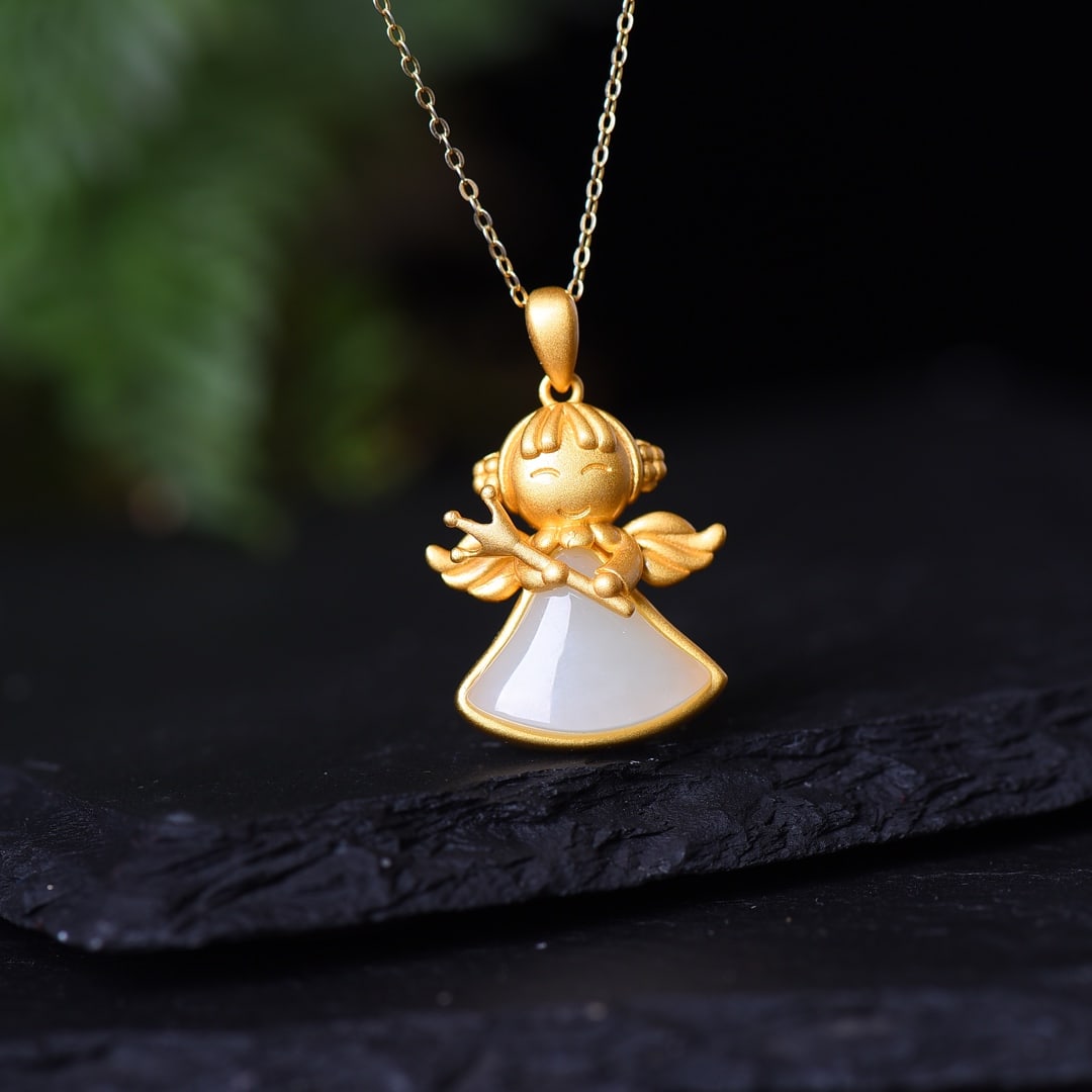An Exquisite Sterling Silver-Gold Plated Inlaid White Jade Pendant: An Exquisite Sterling Silver-Gold Plated Inlaid White Jade Pendant,Size:0.5inx0.6in 纯银镀金镶白玉吊坠
