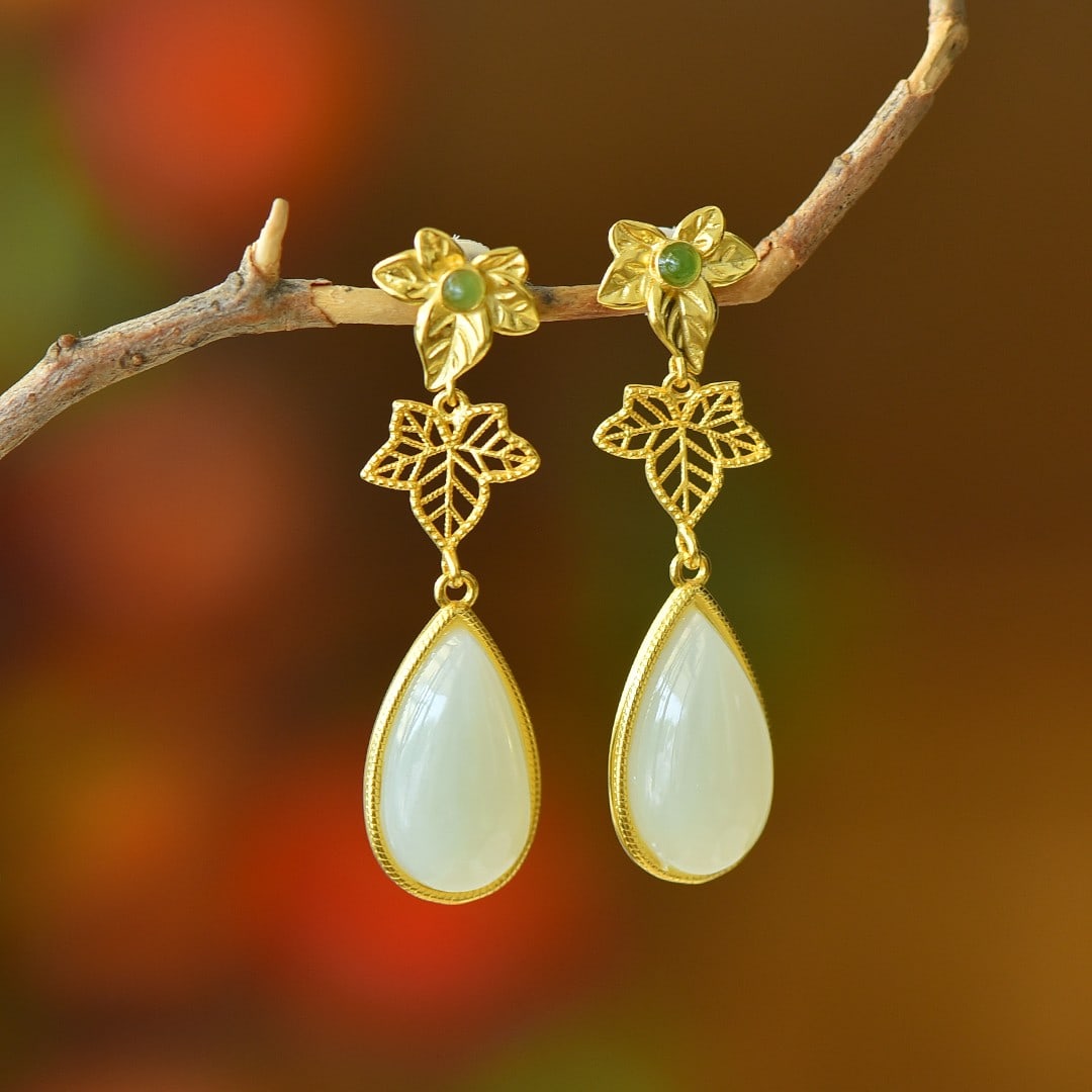 A Pair of Exquisite Sterling Silver Inlaid White Jade Earrings: A Pair of Exquisite Sterling Silver Inlaid White Jade Earrings,Size:0.4inx0.7in 一对纯银镶白玉耳环