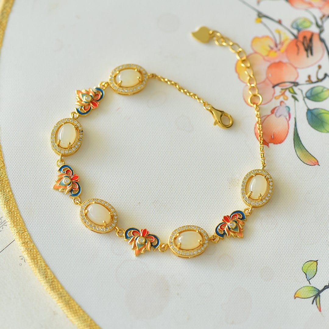 An Exquisite Sterling Silver Inlaid White Jade Flower Pattern Bracelet: An Exquisite Sterling Silver Inlaid White Jade Flower Pattern Bracelet,Size:0.2inx0.3in 纯银镶白玉花卉纹手链
